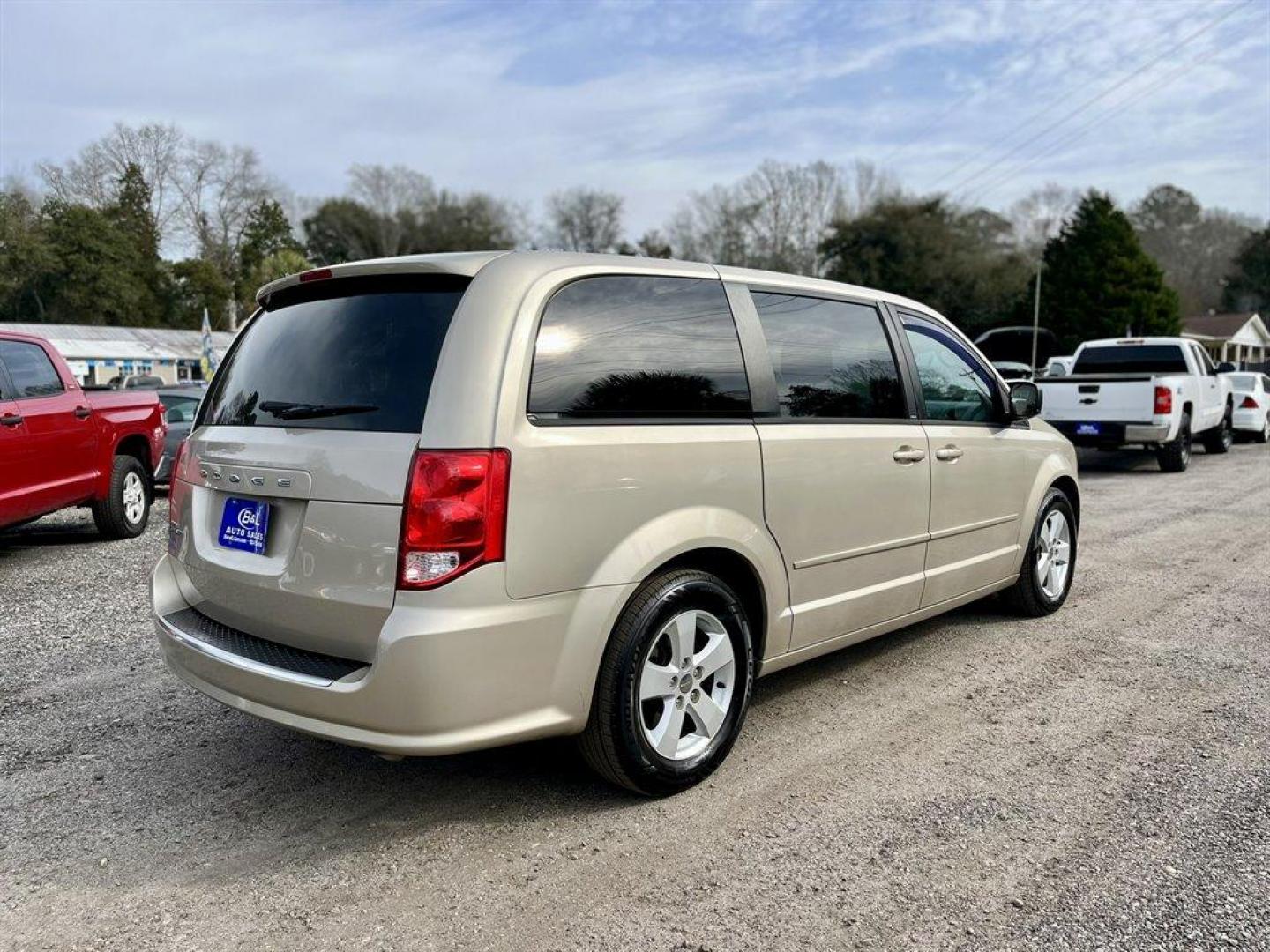 2013 Beige /Grey Dodge Grand Caravan (2C4RDGBG1DR) with an 3.6l V6 MPI Dohc VVT Flex engine, Automatic transmission, located at 745 East Steele Rd., West Columbia, SC, 29170, (803) 755-9148, 33.927212, -81.148483 - Special Internet Price! 2013 Dodge Grand Caravan with AM/FM stereo, Air conditioning, Cruise control, Keyless entry, Cloth interior, 2nd row fold-in-floor bucket seats, 3rd row Stow 'N Go with tailgate seats, Powered windows, Powered door locks, Plus more! - Photo#2