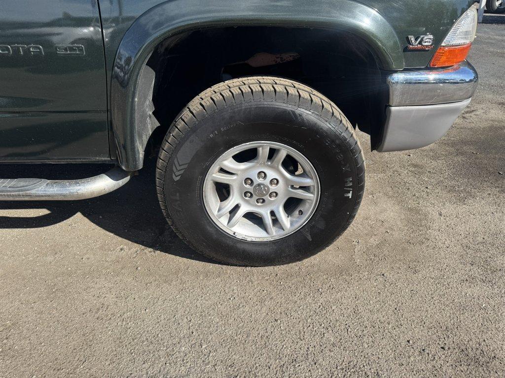 1997 Green /Tan Dodge Dakota (1B7GG23Y1VS) with an 5.2l V8 MPI 5.2l engine, Manual transmission, located at 745 East Steele Rd., West Columbia, SC, 29170, (803) 755-9148, 33.927212, -81.148483 - Photo#24
