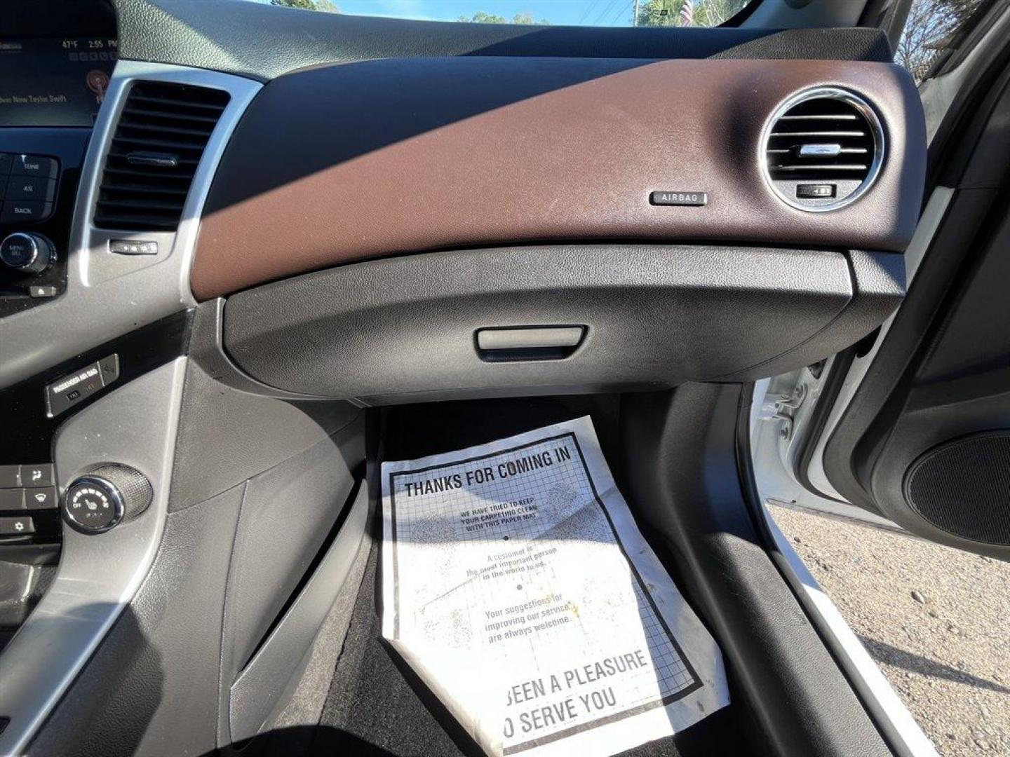 2015 White /Black Chevrolet Cruze (1G1PE5SB7F7) with an 1.4l I-4 MFI Dohc T/C 1.4 engine, Automatic transmission, located at 745 East Steele Rd., West Columbia, SC, 29170, (803) 755-9148, 33.927212, -81.148483 - Special Internet Price! 2015 Chevrolet Cruze LT with Bluetooth, AM/FM stereo, Cruise control, Remote Keyless Entry, Air conditioning, Powered driver seat, Two-toned leather interior, Rear 60/40 split-folding bench, Powered windows, Powered door locks, Plus more! - Photo#23