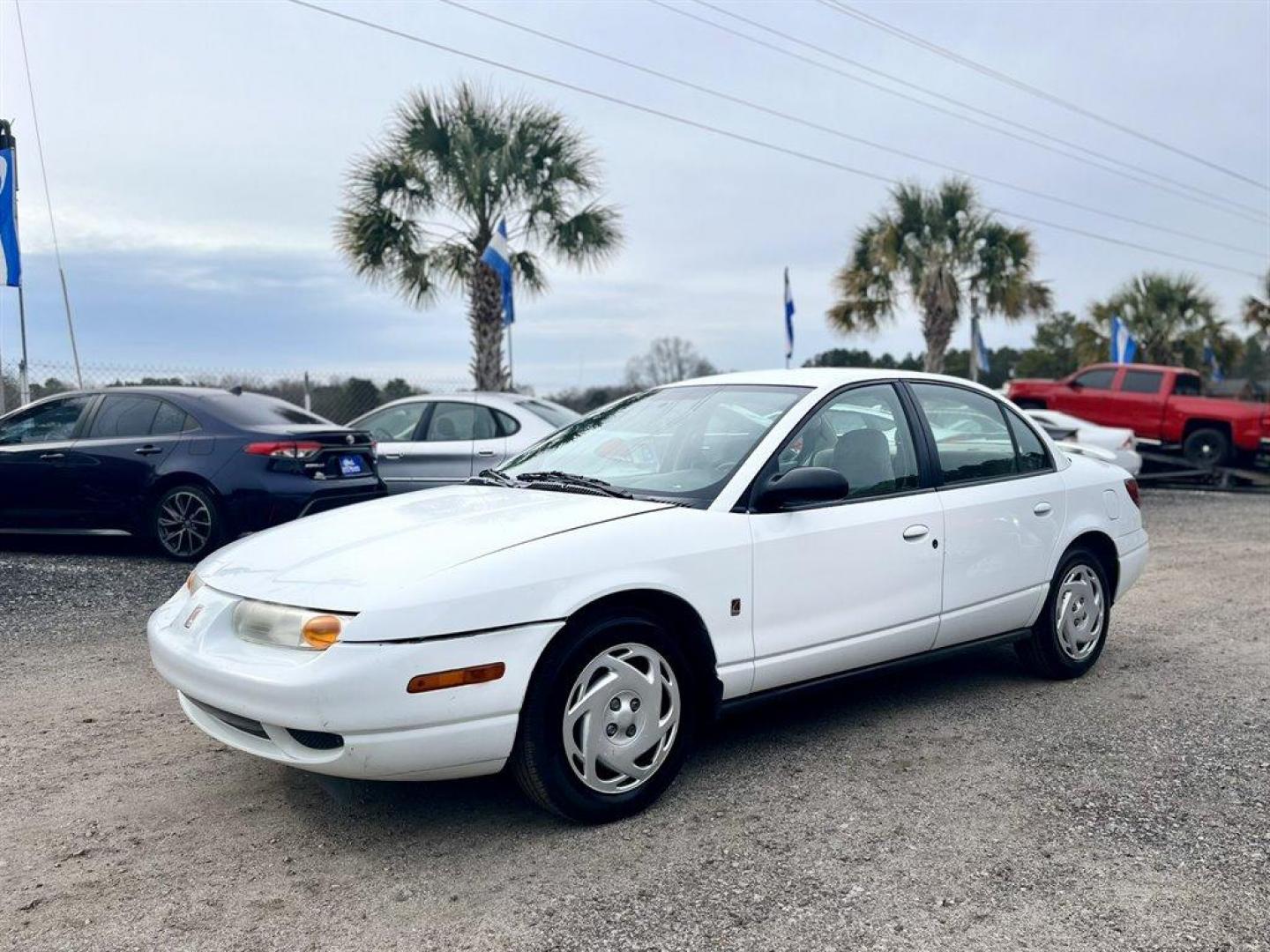 2001 White /Grey Saturn S-Series (1G8ZK52781Z) with an 1.9l I-4 SFI Dohc 1.9l engine, Automatic transmission, located at 745 East Steele Rd., West Columbia, SC, 29170, (803) 755-9148, 33.927212, -81.148483 - Special Internet Price! 2001 Saturn S-Series with AM/FM stereo, Air conditioning, Cruise control, Cloth seat upholstery, Rear 60/40 split fold-down, Powered windows, Powered door locks, Plus more! - Photo#0