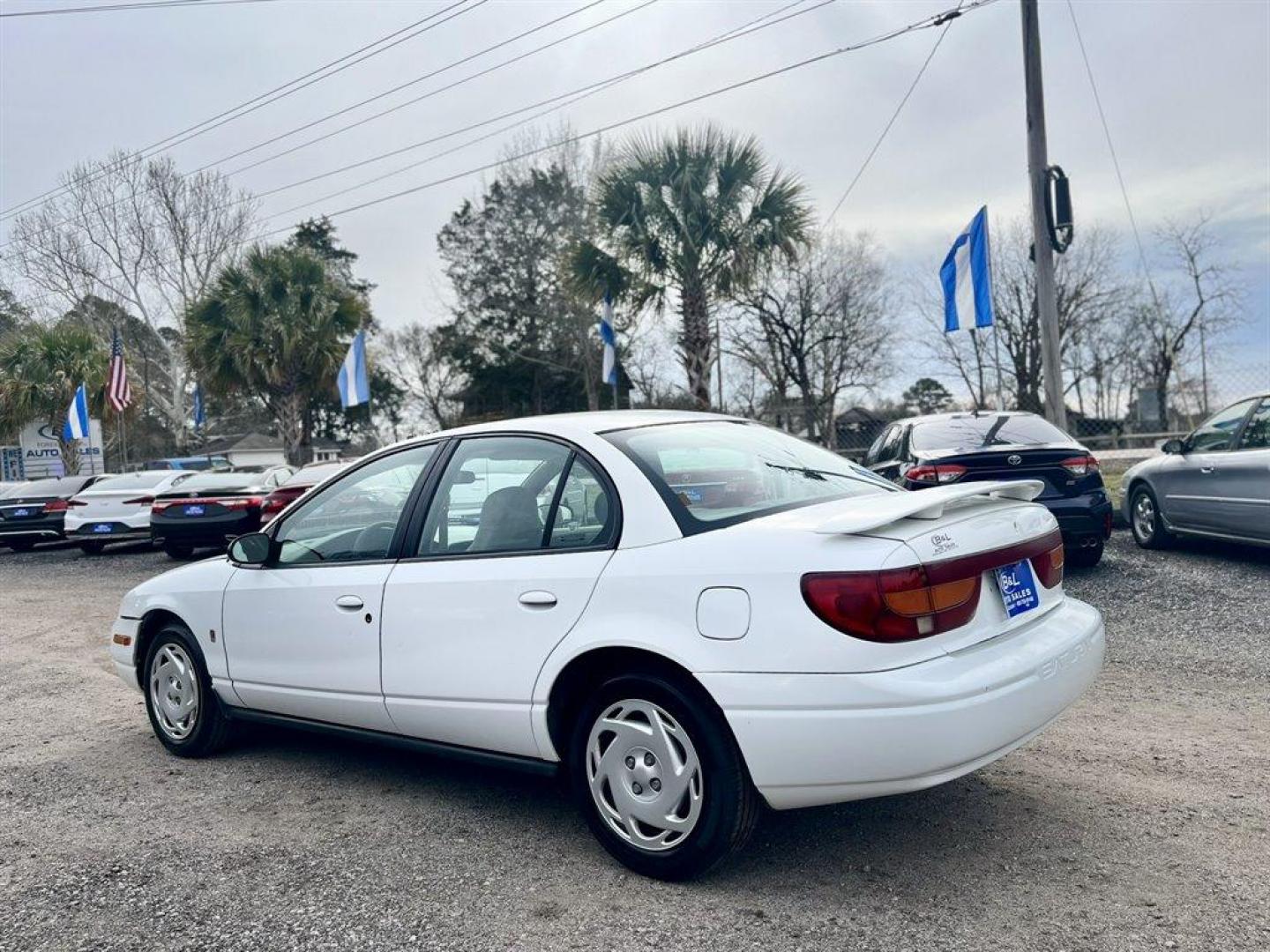 2001 White /Grey Saturn S-Series (1G8ZK52781Z) with an 1.9l I-4 SFI Dohc 1.9l engine, Automatic transmission, located at 745 East Steele Rd., West Columbia, SC, 29170, (803) 755-9148, 33.927212, -81.148483 - Special Internet Price! 2001 Saturn S-Series with AM/FM stereo, Air conditioning, Cruise control, Cloth seat upholstery, Rear 60/40 split fold-down, Powered windows, Powered door locks, Plus more! - Photo#1