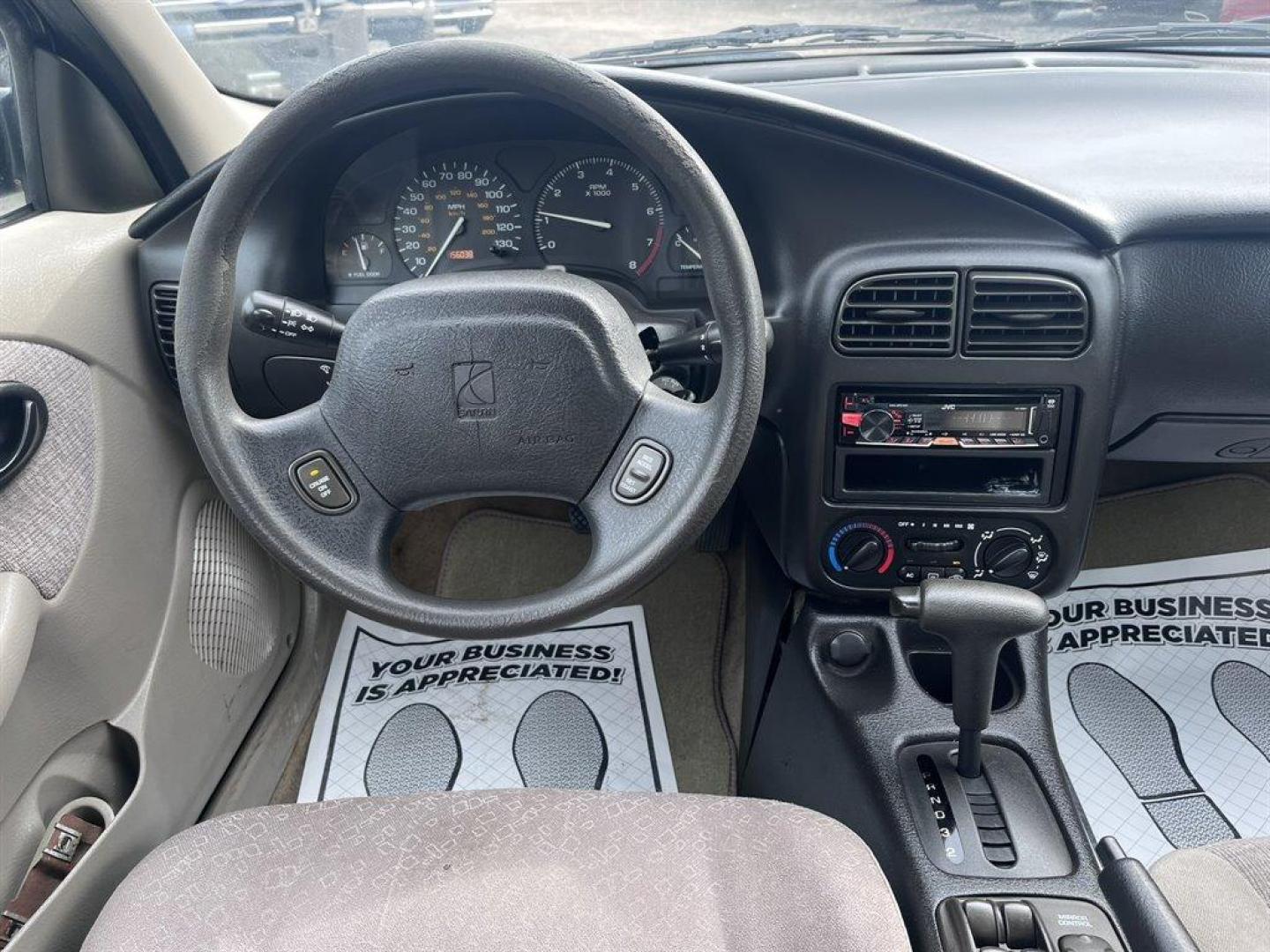 2001 White /Grey Saturn S-Series (1G8ZK52781Z) with an 1.9l I-4 SFI Dohc 1.9l engine, Automatic transmission, located at 745 East Steele Rd., West Columbia, SC, 29170, (803) 755-9148, 33.927212, -81.148483 - Special Internet Price! 2001 Saturn S-Series with AM/FM stereo, Air conditioning, Cruise control, Cloth seat upholstery, Rear 60/40 split fold-down, Powered windows, Powered door locks, Plus more! - Photo#4