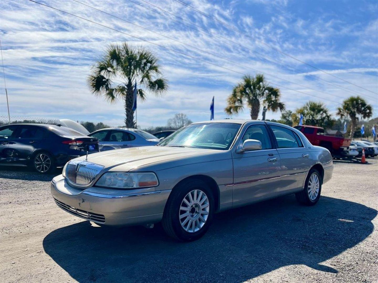 2005 Gold /Tan Lincoln Town CAR (1LNHM81W85Y) with an 4.6l V8 EFI Sohc 4.6l engine, Automatic transmission, located at 745 East Steele Rd., West Columbia, SC, 29170, (803) 755-9148, 33.927212, -81.148483 - Special Internet Price! 2005 Lincoln Town Car with AM/FM radio, Dual zone electronic climate control, Cruise control, Remote keyless entry, Powered windows, Powered door locks, Plus more! - Photo#0