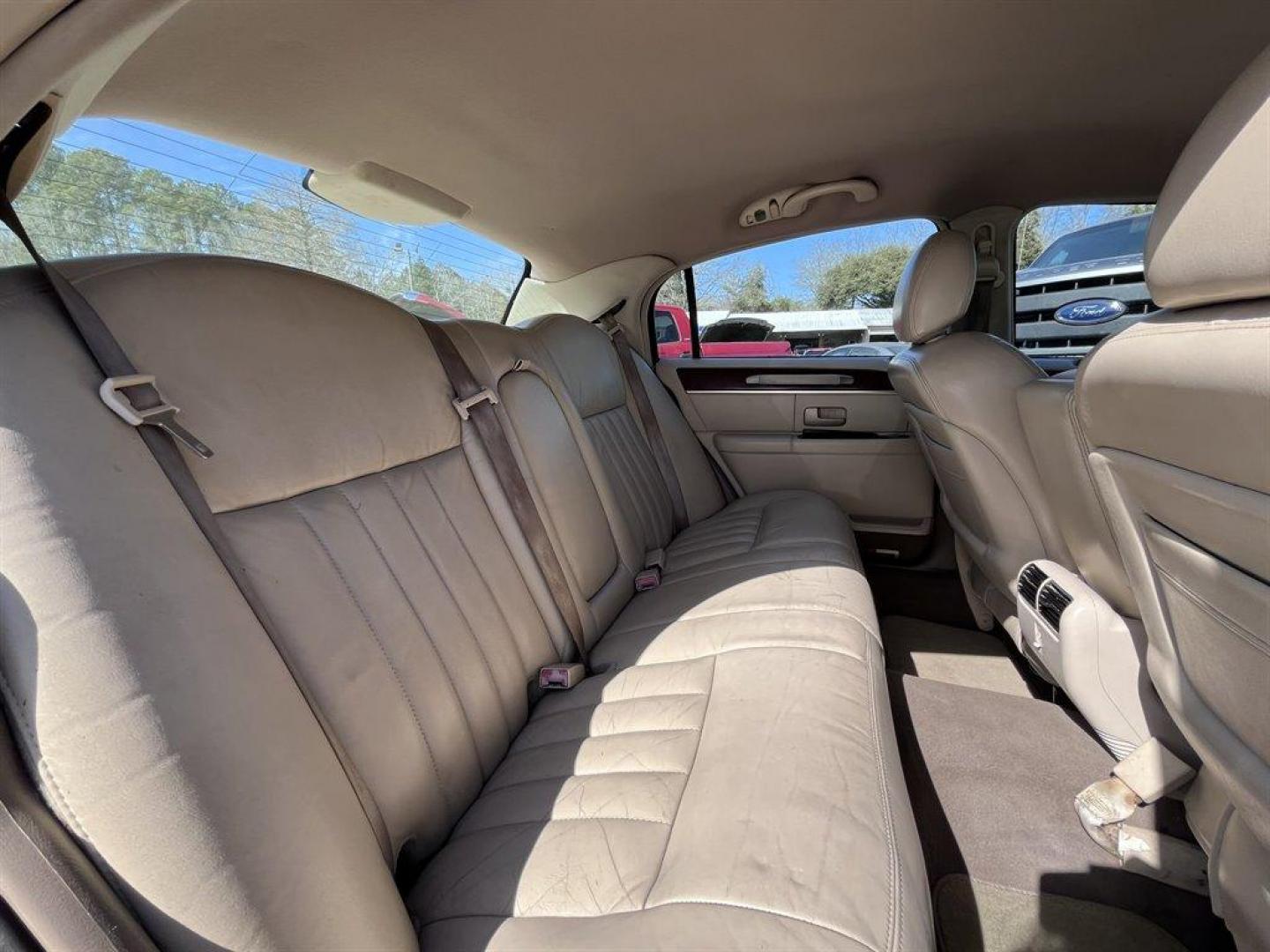 2005 Gold /Tan Lincoln Town CAR (1LNHM81W85Y) with an 4.6l V8 EFI Sohc 4.6l engine, Automatic transmission, located at 745 East Steele Rd., West Columbia, SC, 29170, (803) 755-9148, 33.927212, -81.148483 - Special Internet Price! 2005 Lincoln Town Car with AM/FM radio, Dual zone electronic climate control, Cruise control, Remote keyless entry, Powered windows, Powered door locks, Plus more! - Photo#19