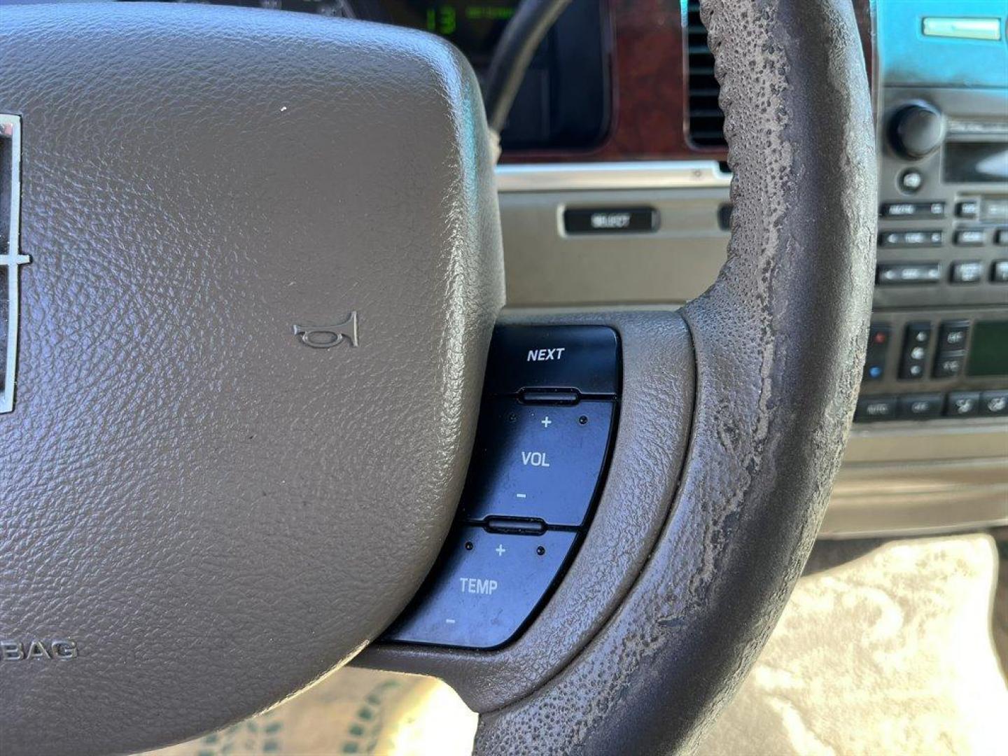 2005 Gold /Tan Lincoln Town CAR (1LNHM81W85Y) with an 4.6l V8 EFI Sohc 4.6l engine, Automatic transmission, located at 745 East Steele Rd., West Columbia, SC, 29170, (803) 755-9148, 33.927212, -81.148483 - Special Internet Price! 2005 Lincoln Town Car with AM/FM radio, Dual zone electronic climate control, Cruise control, Remote keyless entry, Powered windows, Powered door locks, Plus more! - Photo#7