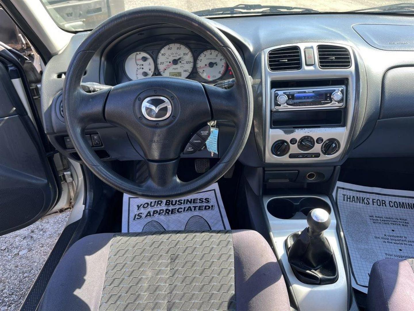 2002 Gold /Beige Mazda Protege (JM1BJ226021) with an 2.0l I-4 EFI Dohc 2.0l engine, 5 Speed Manual transmission, located at 745 East Steele Rd., West Columbia, SC, 29170, (803) 755-9148, 33.927212, -81.148483 - Special Internet Price! 2002 Mazda Protege with AM/FM stereo, Keyless remote, Air conditioning, Cruise control, Sunroof, Manual transmission, Cloth reclining front bucket seats, 60/40 split fold-down rear, Powered windows, Plus more! - Photo#4