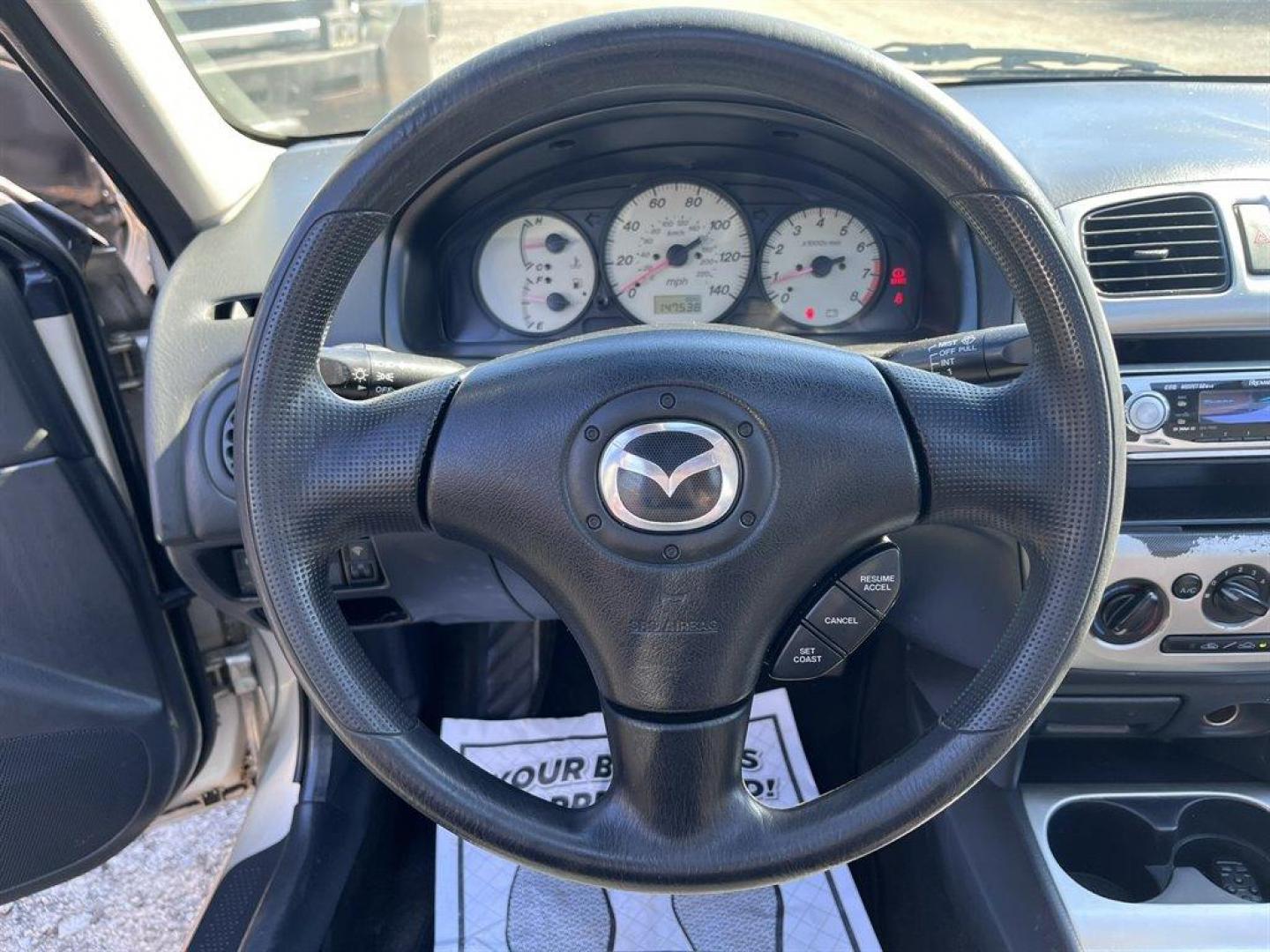 2002 Gold /Beige Mazda Protege (JM1BJ226021) with an 2.0l I-4 EFI Dohc 2.0l engine, 5 Speed Manual transmission, located at 745 East Steele Rd., West Columbia, SC, 29170, (803) 755-9148, 33.927212, -81.148483 - Special Internet Price! 2002 Mazda Protege with AM/FM stereo, Keyless remote, Air conditioning, Cruise control, Sunroof, Manual transmission, Cloth reclining front bucket seats, 60/40 split fold-down rear, Powered windows, Plus more! - Photo#5