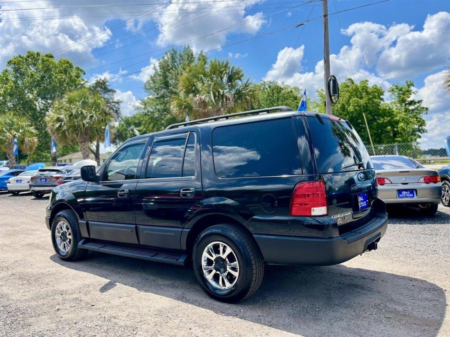 2005 Black /Grey Ford Expedition (1FMPU15575L) with an 5.4l V8 EFI Sohc 3v 5.4l engine, Automatic transmission, located at 745 East Steele Rd., West Columbia, SC, 29170, (803) 755-9148, 33.927212, -81.148483 - Special Internet Price! 2005 Ford Expedition XLT with AM/FM stereo, Cruise control, Manual air conditioning, Cloth interior, 3rd row seating, 3rd row powered, Powered windows, Powered door locks, Plus more! - Photo#1