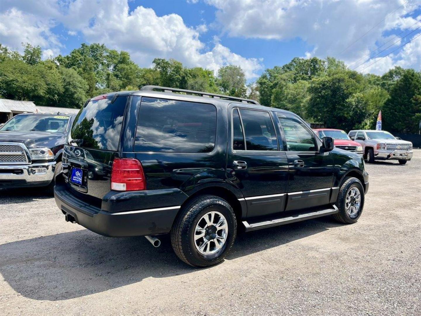 2005 Black /Grey Ford Expedition (1FMPU15575L) with an 5.4l V8 EFI Sohc 3v 5.4l engine, Automatic transmission, located at 745 East Steele Rd., West Columbia, SC, 29170, (803) 755-9148, 33.927212, -81.148483 - Special Internet Price! 2005 Ford Expedition XLT with AM/FM stereo, Cruise control, Manual air conditioning, Cloth interior, 3rd row seating, 3rd row powered, Powered windows, Powered door locks, Plus more! - Photo#2