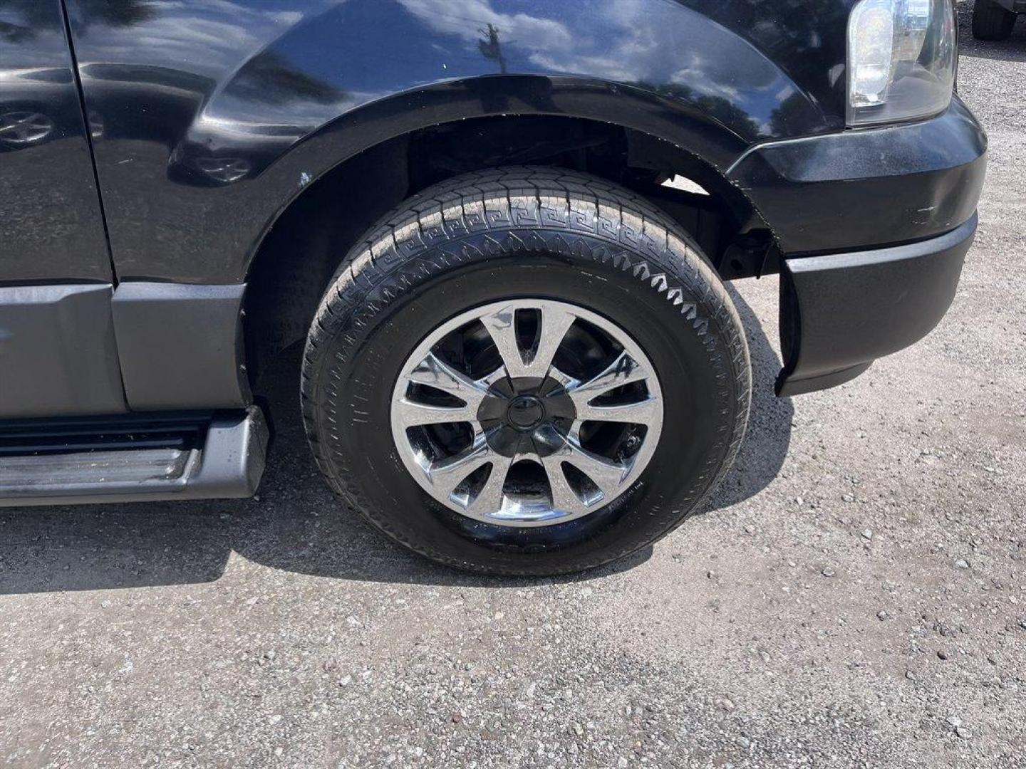 2005 Black /Grey Ford Expedition (1FMPU15575L) with an 5.4l V8 EFI Sohc 3v 5.4l engine, Automatic transmission, located at 745 East Steele Rd., West Columbia, SC, 29170, (803) 755-9148, 33.927212, -81.148483 - Special Internet Price! 2005 Ford Expedition XLT with AM/FM stereo, Cruise control, Manual air conditioning, Cloth interior, 3rd row seating, 3rd row powered, Powered windows, Powered door locks, Plus more! - Photo#31