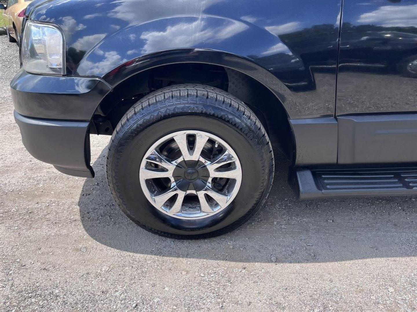 2005 Black /Grey Ford Expedition (1FMPU15575L) with an 5.4l V8 EFI Sohc 3v 5.4l engine, Automatic transmission, located at 745 East Steele Rd., West Columbia, SC, 29170, (803) 755-9148, 33.927212, -81.148483 - Special Internet Price! 2005 Ford Expedition XLT with AM/FM stereo, Cruise control, Manual air conditioning, Cloth interior, 3rd row seating, 3rd row powered, Powered windows, Powered door locks, Plus more! - Photo#34