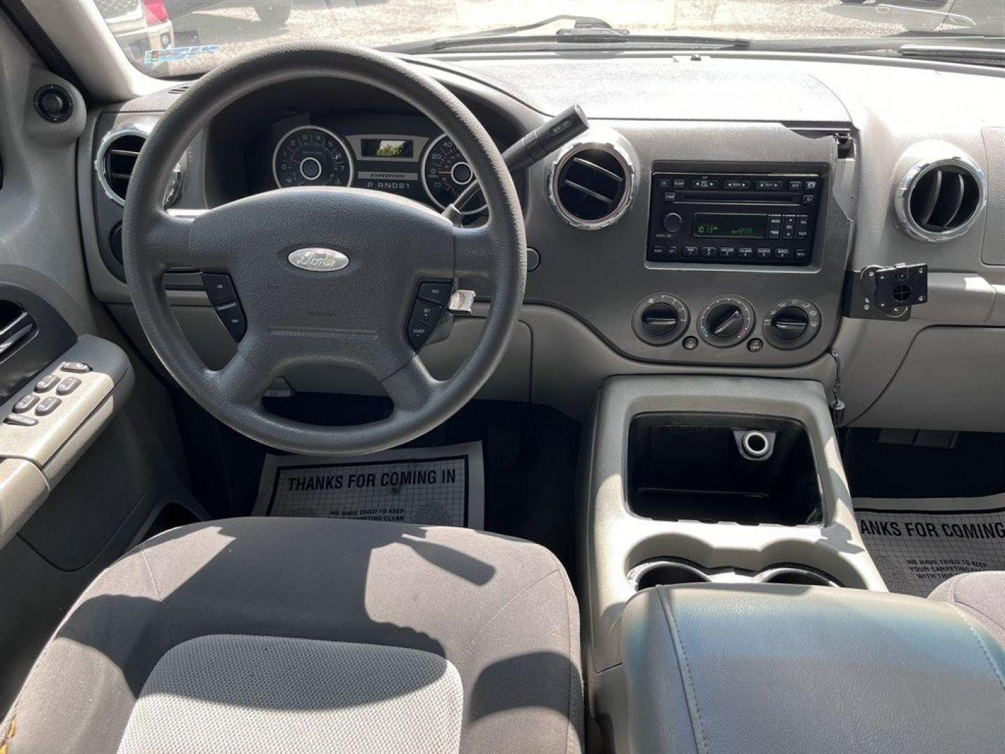 2005 Black /Grey Ford Expedition (1FMPU15575L) with an 5.4l V8 EFI Sohc 3v 5.4l engine, Automatic transmission, located at 745 East Steele Rd., West Columbia, SC, 29170, (803) 755-9148, 33.927212, -81.148483 - Special Internet Price! 2005 Ford Expedition XLT with AM/FM stereo, Cruise control, Manual air conditioning, Cloth interior, 3rd row seating, 3rd row powered, Powered windows, Powered door locks, Plus more! - Photo#4