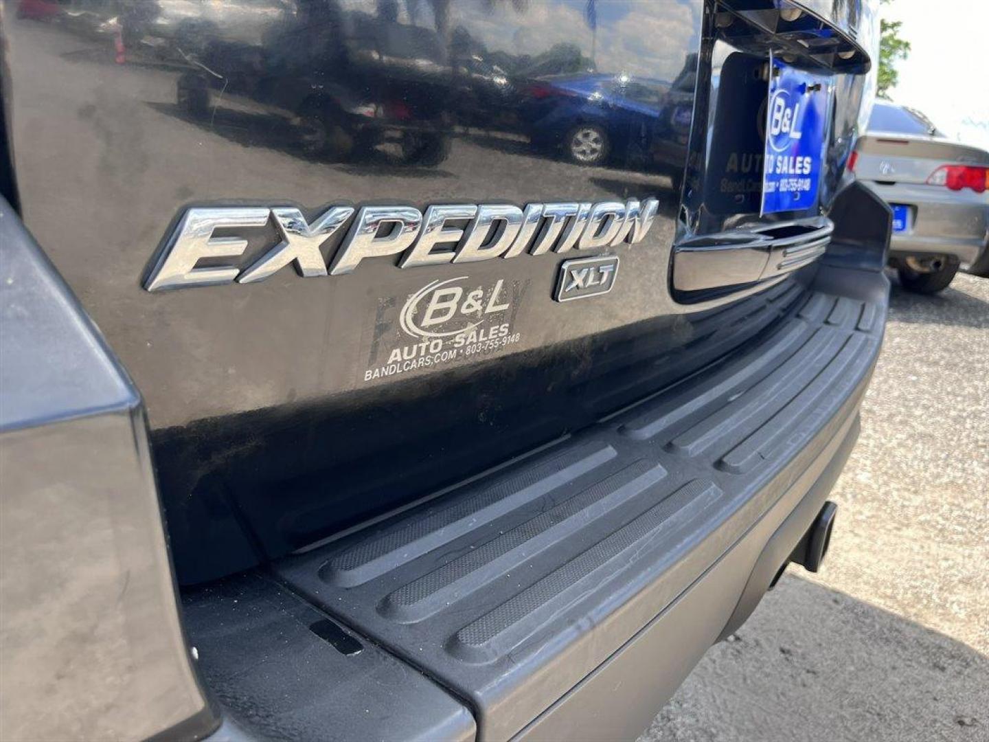 2005 Black /Grey Ford Expedition (1FMPU15575L) with an 5.4l V8 EFI Sohc 3v 5.4l engine, Automatic transmission, located at 745 East Steele Rd., West Columbia, SC, 29170, (803) 755-9148, 33.927212, -81.148483 - Special Internet Price! 2005 Ford Expedition XLT with AM/FM stereo, Cruise control, Manual air conditioning, Cloth interior, 3rd row seating, 3rd row powered, Powered windows, Powered door locks, Plus more! - Photo#30