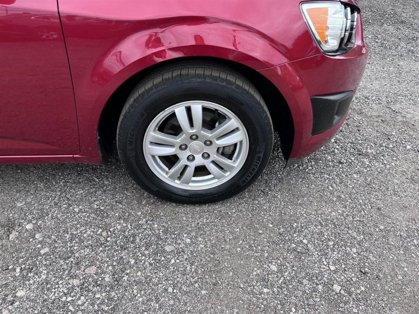 2013 Red /Black Chevrolet Sonic (1G1JD5SB7D4) with an 1.4l I-4 MFI Dohc T/C 1.4 engine, Manual transmission, located at 745 East Steele Rd., West Columbia, SC, 29170, (803) 755-9148, 33.927212, -81.148483 - Special Internet Price! 2013 Chevrolet Sonic LT with Bluetooth, Sirius XM Satellite Radio, Cruise control, Air conditioning, Remote keyless entry, Cloth interior, Powered windows, Powered door locks, Plus more! - Photo#25