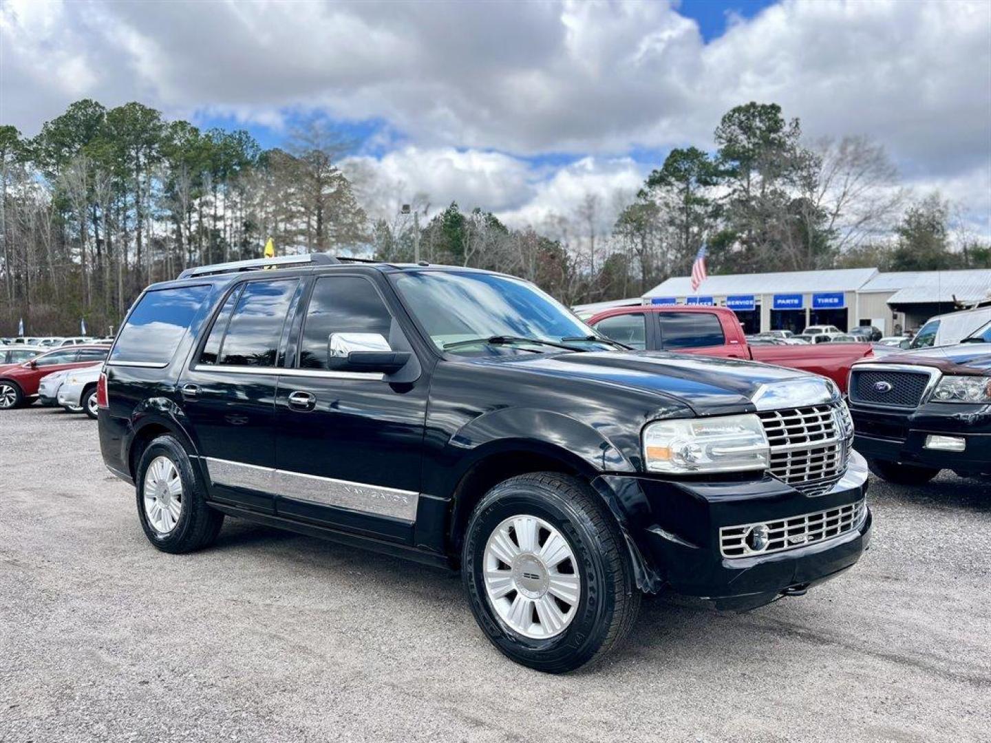 2008 Black /Tan Lincoln Navigator (5LMFU27598L) with an 5.4l V8 EFI Sohc 3v 5.4l engine, Automatic transmission, located at 745 East Steele Rd., West Columbia, SC, 29170, (803) 755-9148, 33.927212, -81.148483 - Special Internet Price! 2008 Lincoln Navigator Luxury with AM/FM stereo, Remote keyless entry, Leather seating surfaces, Cruise control, Sunroof, Rear entertainment, 2nd row center console, Powered 3rd row folding seats, Powered windows, Powered door locks, Plus more! - Photo#3