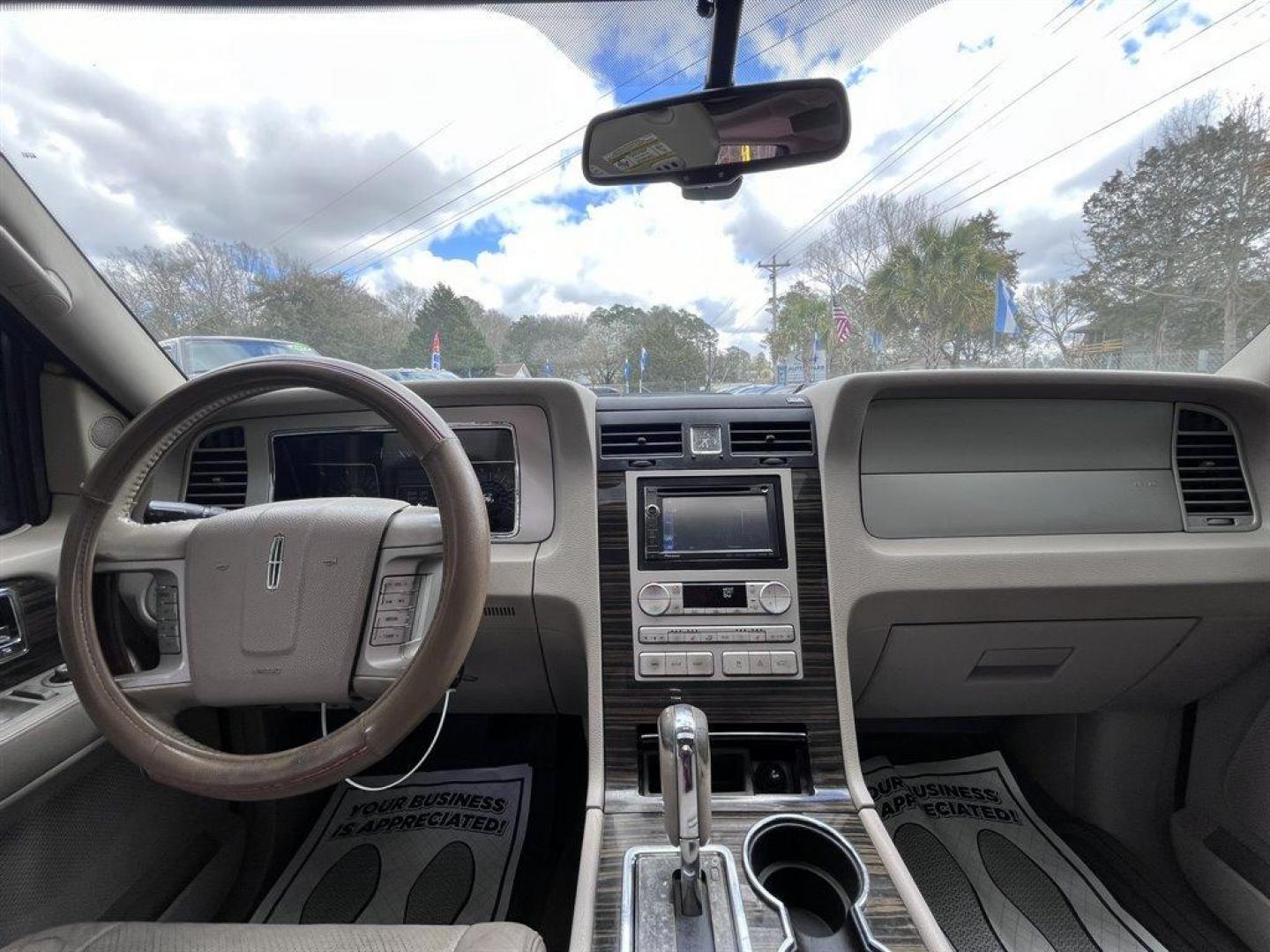 2008 Black /Tan Lincoln Navigator (5LMFU27598L) with an 5.4l V8 EFI Sohc 3v 5.4l engine, Automatic transmission, located at 745 East Steele Rd., West Columbia, SC, 29170, (803) 755-9148, 33.927212, -81.148483 - Special Internet Price! 2008 Lincoln Navigator Luxury with AM/FM stereo, Remote keyless entry, Leather seating surfaces, Cruise control, Sunroof, Rear entertainment, 2nd row center console, Powered 3rd row folding seats, Powered windows, Powered door locks, Plus more! - Photo#4