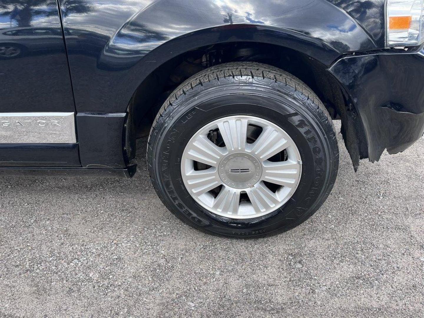 2008 Black /Tan Lincoln Navigator (5LMFU27598L) with an 5.4l V8 EFI Sohc 3v 5.4l engine, Automatic transmission, located at 745 East Steele Rd., West Columbia, SC, 29170, (803) 755-9148, 33.927212, -81.148483 - Special Internet Price! 2008 Lincoln Navigator Luxury with AM/FM stereo, Remote keyless entry, Leather seating surfaces, Cruise control, Sunroof, Rear entertainment, 2nd row center console, Powered 3rd row folding seats, Powered windows, Powered door locks, Plus more! - Photo#26