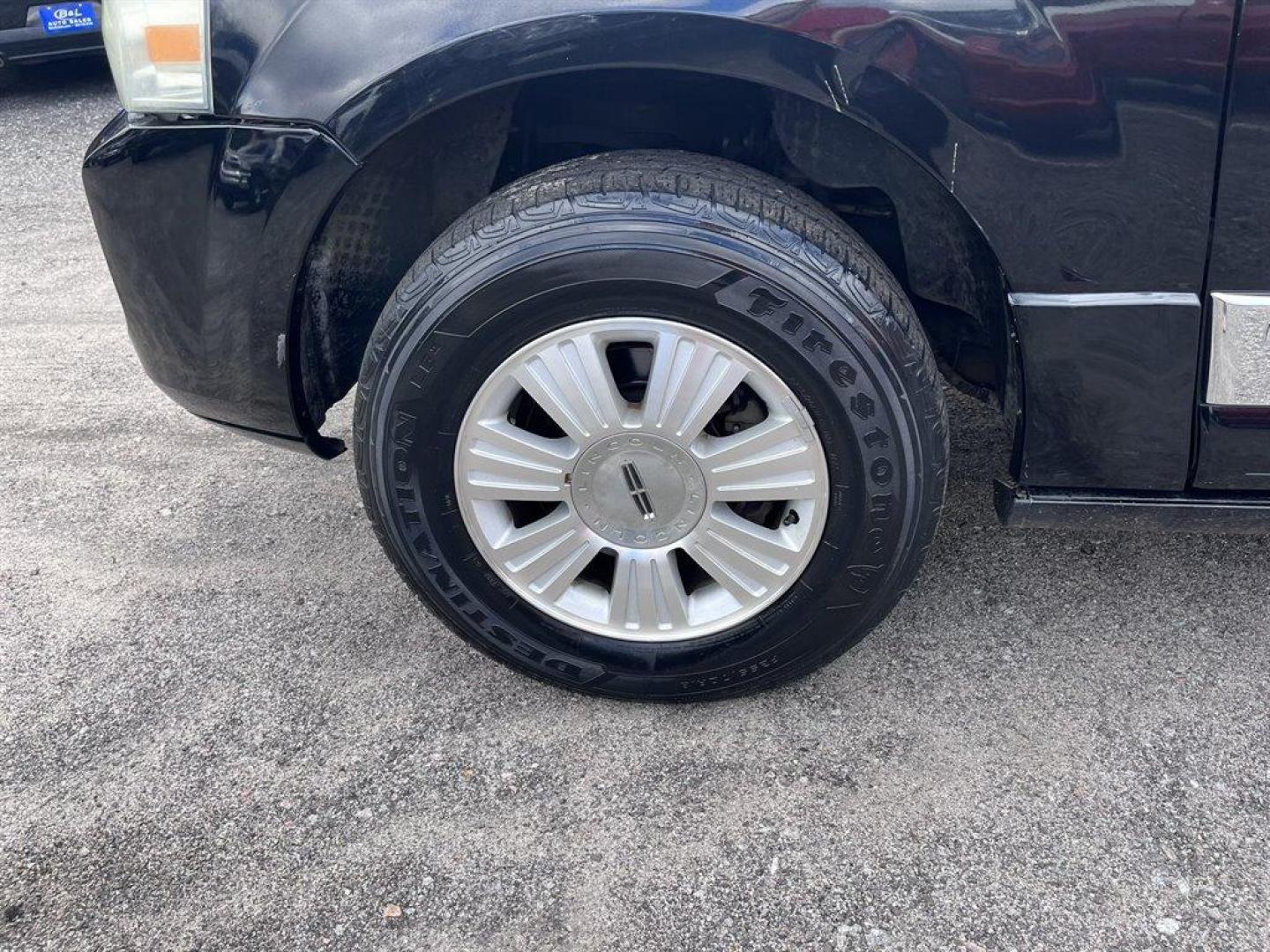 2008 Black /Tan Lincoln Navigator (5LMFU27598L) with an 5.4l V8 EFI Sohc 3v 5.4l engine, Automatic transmission, located at 745 East Steele Rd., West Columbia, SC, 29170, (803) 755-9148, 33.927212, -81.148483 - Special Internet Price! 2008 Lincoln Navigator Luxury with AM/FM stereo, Remote keyless entry, Leather seating surfaces, Cruise control, Sunroof, Rear entertainment, 2nd row center console, Powered 3rd row folding seats, Powered windows, Powered door locks, Plus more! - Photo#29