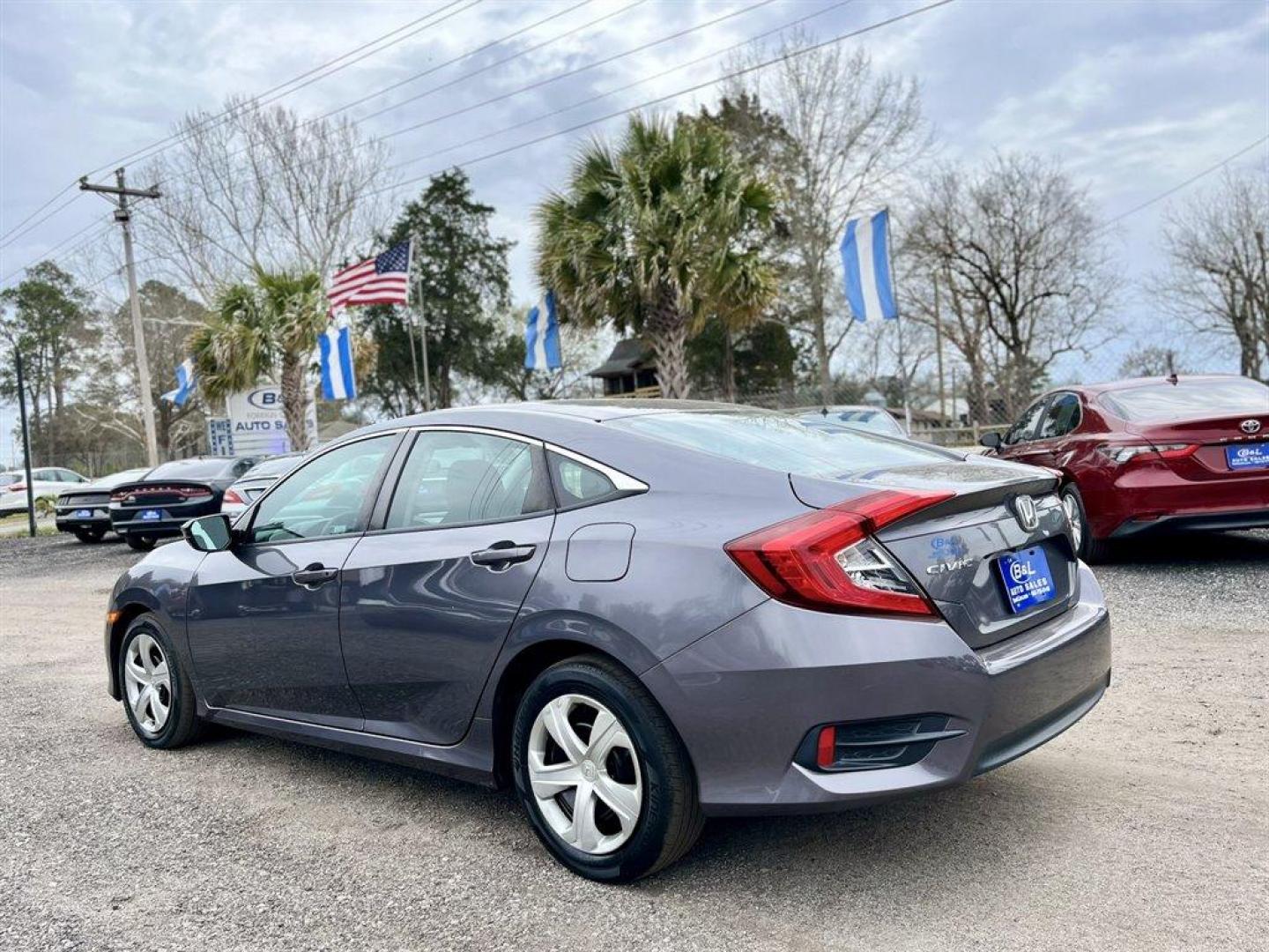 2018 Grey /Black Honda Civic (2HGFC2F56JH) with an 2.0l I-4 MPI Dohc 2.0l engine, Automatic transmission, located at 745 East Steele Rd., West Columbia, SC, 29170, (803) 755-9148, 33.927212, -81.148483 - Photo#1