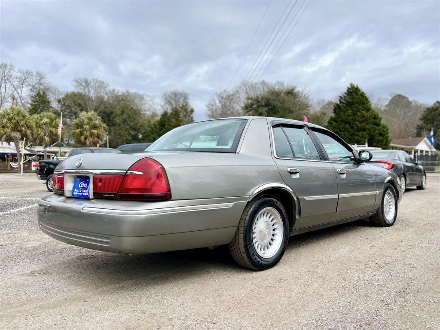 1999 Grey /Grey Mercury Grand Marquis (2MEFM75W1XX) with an 4.6l V8 EFI Sohc 4.6l engine, Automatic transmission, located at 745 East Steele Rd., West Columbia, SC, 29170, (803) 755-9148, 33.927212, -81.148483 - 1999 Mercury Grand Marquis LS with Electronic AM/FM stereo radio, Cruise control, Manual air conditioning, Leather interior, Powered windows, Powered door locks, Plus more! - Photo#2