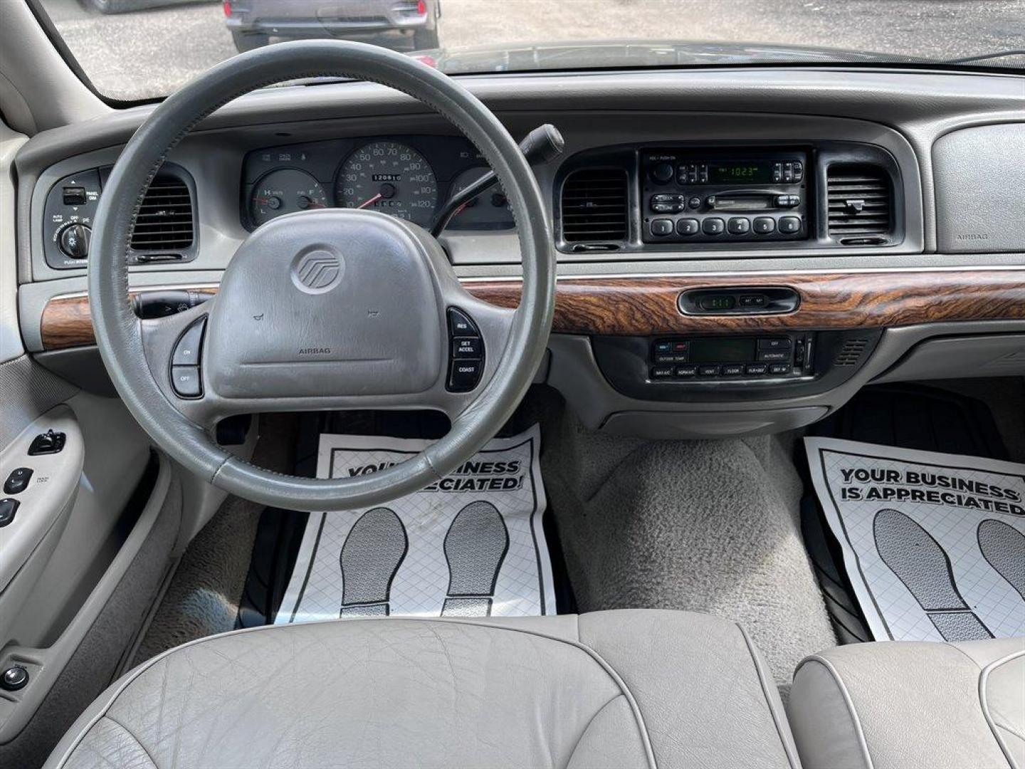 1999 Grey /Grey Mercury Grand Marquis (2MEFM75W1XX) with an 4.6l V8 EFI Sohc 4.6l engine, Automatic transmission, located at 745 East Steele Rd., West Columbia, SC, 29170, (803) 755-9148, 33.927212, -81.148483 - 1999 Mercury Grand Marquis LS with Electronic AM/FM stereo radio, Cruise control, Manual air conditioning, Leather interior, Powered windows, Powered door locks, Plus more! - Photo#4