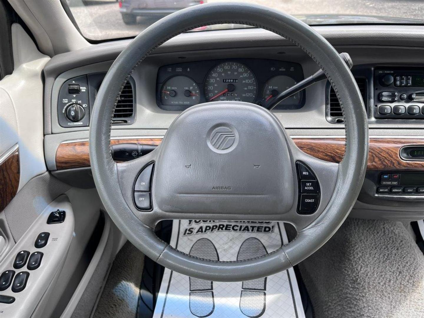 1999 Grey /Grey Mercury Grand Marquis (2MEFM75W1XX) with an 4.6l V8 EFI Sohc 4.6l engine, Automatic transmission, located at 745 East Steele Rd., West Columbia, SC, 29170, (803) 755-9148, 33.927212, -81.148483 - 1999 Mercury Grand Marquis LS with Electronic AM/FM stereo radio, Cruise control, Manual air conditioning, Leather interior, Powered windows, Powered door locks, Plus more! - Photo#5