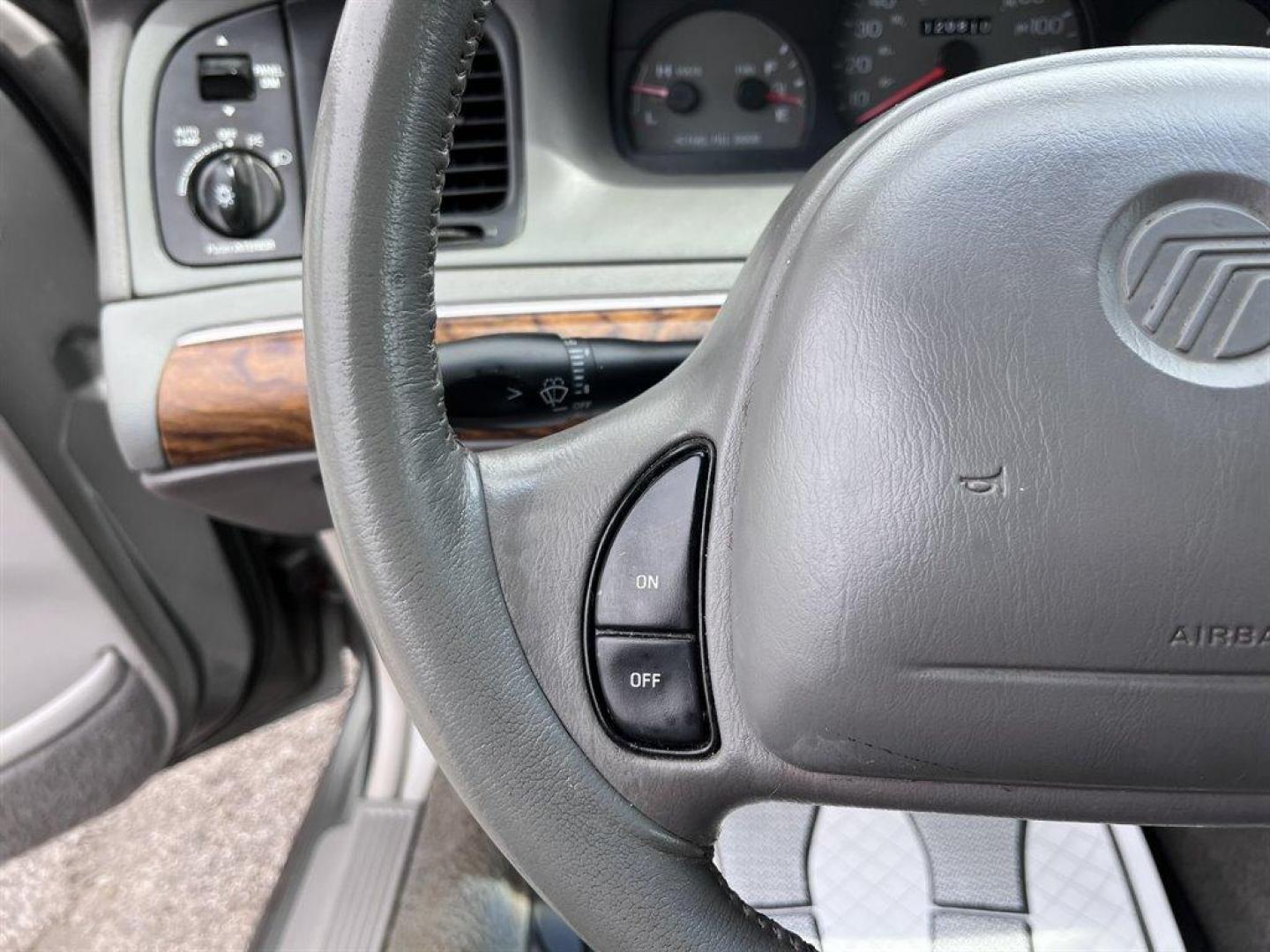 1999 Grey /Grey Mercury Grand Marquis (2MEFM75W1XX) with an 4.6l V8 EFI Sohc 4.6l engine, Automatic transmission, located at 745 East Steele Rd., West Columbia, SC, 29170, (803) 755-9148, 33.927212, -81.148483 - 1999 Mercury Grand Marquis LS with Electronic AM/FM stereo radio, Cruise control, Manual air conditioning, Leather interior, Powered windows, Powered door locks, Plus more! - Photo#6