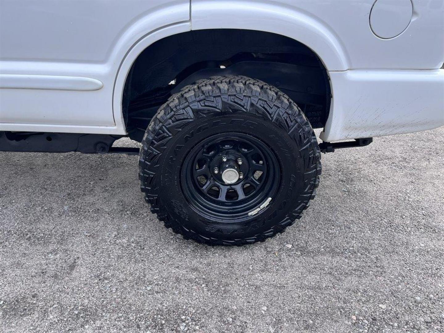 2003 White /Black Chevrolet Blazer (1GNDT13X43K) with an 4.3l V6 CPI 4.3l engine, Automatic transmission, located at 745 East Steele Rd., West Columbia, SC, 29170, (803) 755-9148, 33.927212, -81.148483 - Special Internet Price! 2003 Chevrolet Blazer LS with AM/FM stereo, Air conditioning, Black cloth interior, Clam shell trunk, Powered windows, Powered door locks, Plus more! - Photo#30