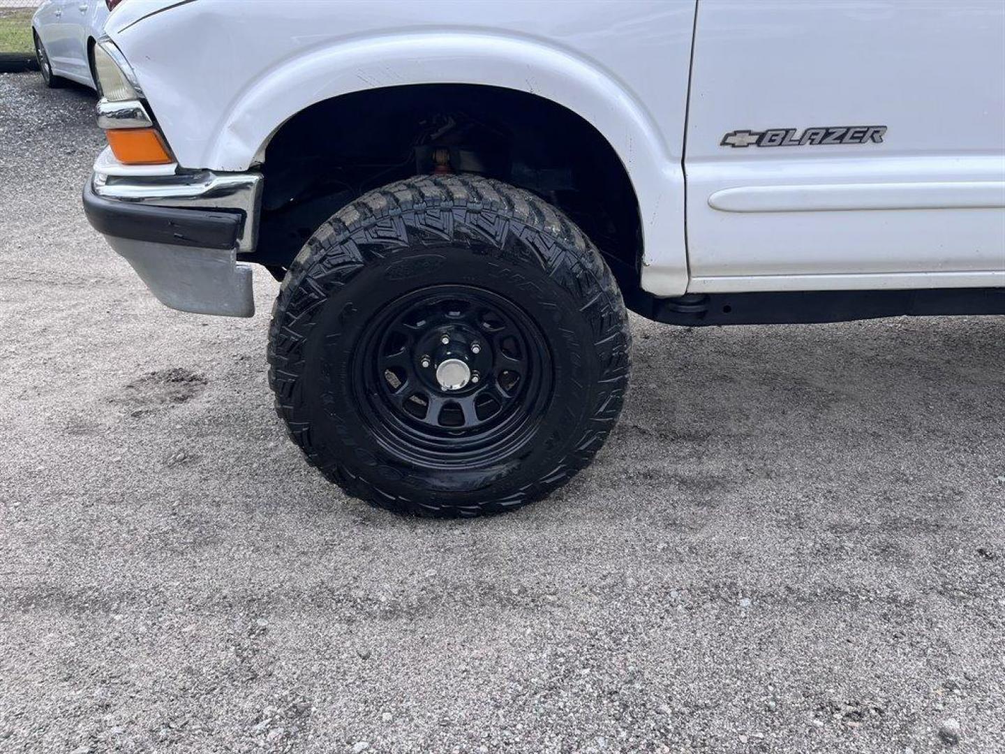 2003 White /Black Chevrolet Blazer (1GNDT13X43K) with an 4.3l V6 CPI 4.3l engine, Automatic transmission, located at 745 East Steele Rd., West Columbia, SC, 29170, (803) 755-9148, 33.927212, -81.148483 - Special Internet Price! 2003 Chevrolet Blazer LS with AM/FM stereo, Air conditioning, Black cloth interior, Clam shell trunk, Powered windows, Powered door locks, Plus more! - Photo#31