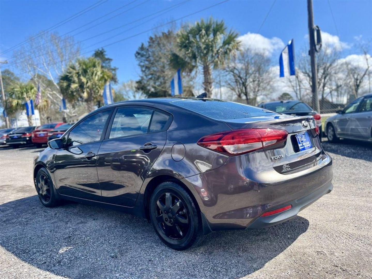 2018 Brown /Black Kia Forte (3KPFK4A75JE) with an 2.0l I-4 MPI Dohc 2.0l engine, Automatic transmission, located at 745 East Steele Rd., West Columbia, SC, 29170, (803) 755-9148, 33.927212, -81.148483 - Special Internet Price! 2018 Kia Forte LX with AM/FM/CD/MP3/SiriusXM Audio System, Remote Keyless Entry, Manual Air Conditioning, Cloth interior, Front Bucket Seats, Rear 60-40 Folding Bench, Powered Windows, Powered Door Locks, Plus More! - Photo#1