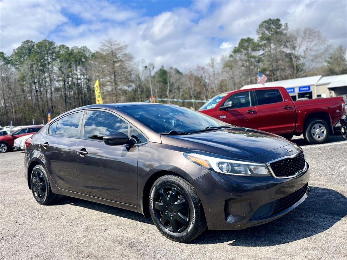 2018 Brown /Black Kia Forte (3KPFK4A75JE) with an 2.0l I-4 MPI Dohc 2.0l engine, Automatic transmission, located at 745 East Steele Rd., West Columbia, SC, 29170, (803) 755-9148, 33.927212, -81.148483 - Special Internet Price! 2018 Kia Forte LX with AM/FM/CD/MP3/SiriusXM Audio System, Remote Keyless Entry, Manual Air Conditioning, Cloth interior, Front Bucket Seats, Rear 60-40 Folding Bench, Powered Windows, Powered Door Locks, Plus More! - Photo#3