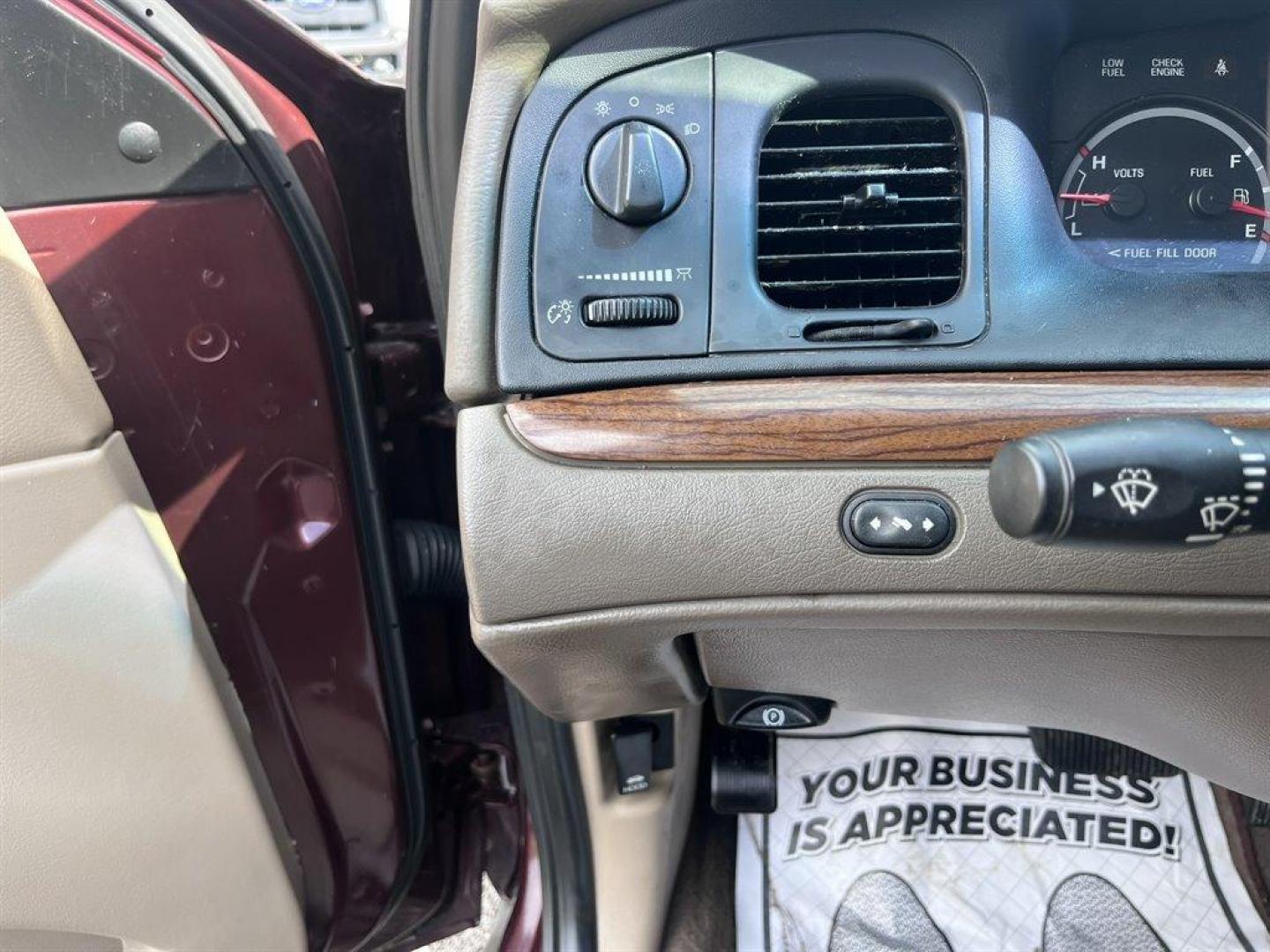 2003 Burgundy /Tan Ford Crown Victoria (2FAFP74W53X) with an 4.6l V8 EFI Sohc 4.6l engine, Automatic transmission, located at 745 East Steele Rd., West Columbia, SC, 29170, (803) 755-9148, 33.927212, -81.148483 - Special Internet Price! 2003 Ford Crown Victoria LX with AM/FM stereo radio, Air conditioning, Split-bench front seat, Leather interior, Powered windows, Powered door locks, Plus more! - Photo#13