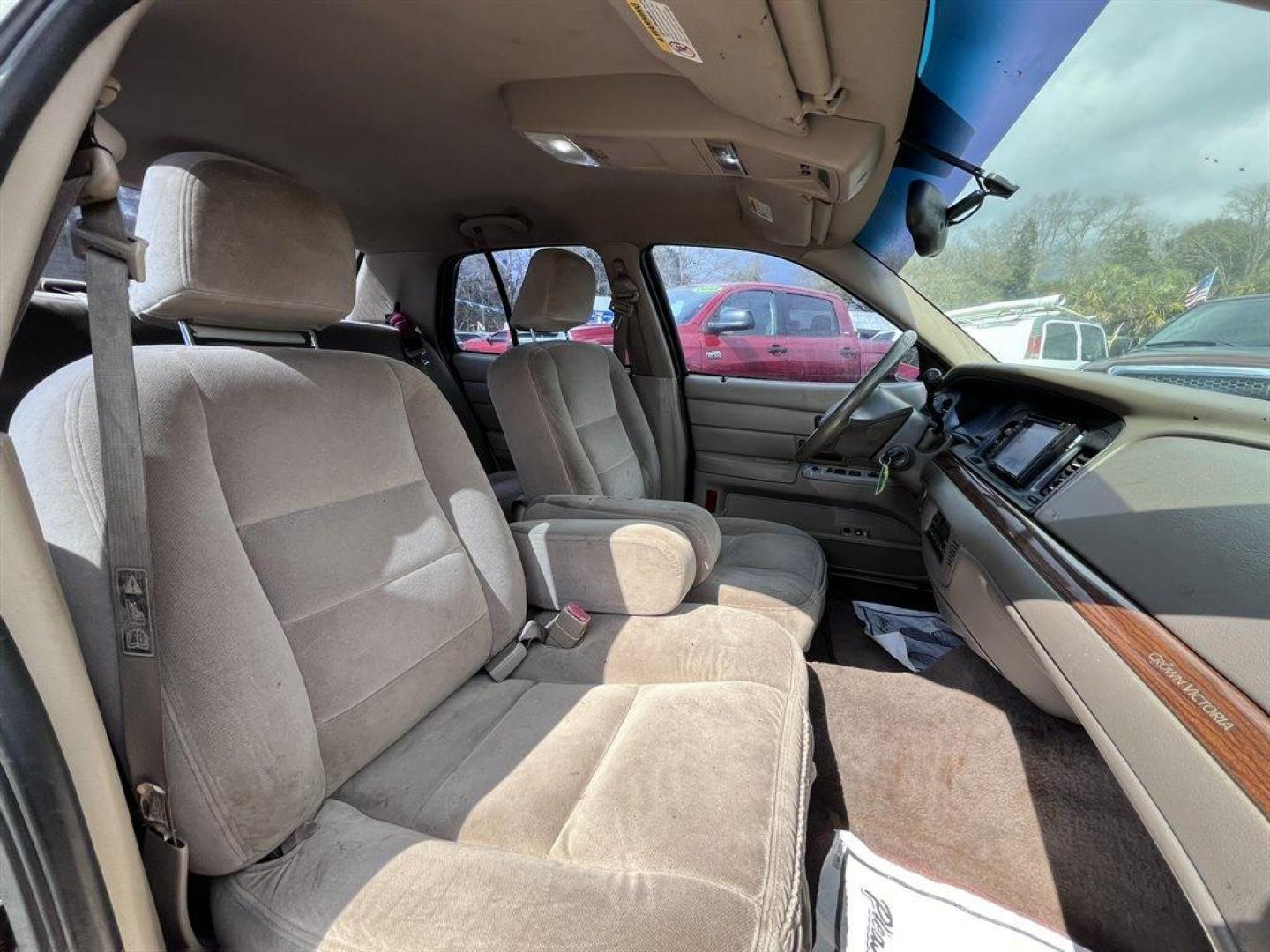 2003 Burgundy /Tan Ford Crown Victoria (2FAFP74W53X) with an 4.6l V8 EFI Sohc 4.6l engine, Automatic transmission, located at 745 East Steele Rd., West Columbia, SC, 29170, (803) 755-9148, 33.927212, -81.148483 - Special Internet Price! 2003 Ford Crown Victoria LX with AM/FM stereo radio, Air conditioning, Split-bench front seat, Leather interior, Powered windows, Powered door locks, Plus more! - Photo#21