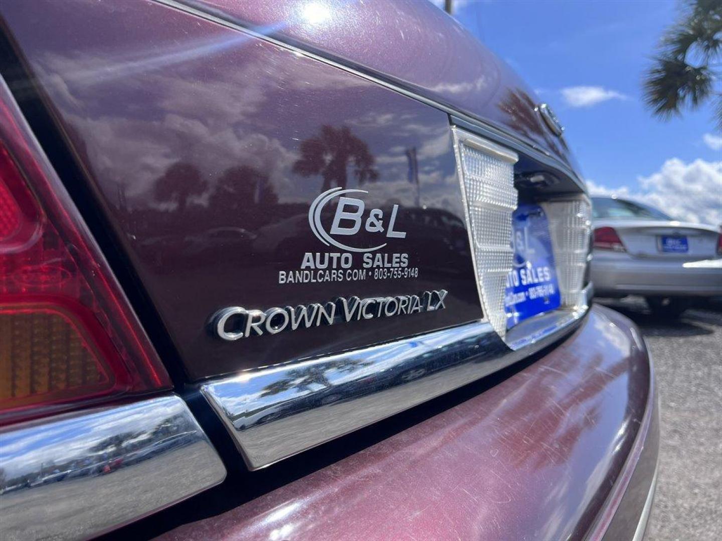 2003 Burgundy /Tan Ford Crown Victoria (2FAFP74W53X) with an 4.6l V8 EFI Sohc 4.6l engine, Automatic transmission, located at 745 East Steele Rd., West Columbia, SC, 29170, (803) 755-9148, 33.927212, -81.148483 - Special Internet Price! 2003 Ford Crown Victoria LX with AM/FM stereo radio, Air conditioning, Split-bench front seat, Leather interior, Powered windows, Powered door locks, Plus more! - Photo#22