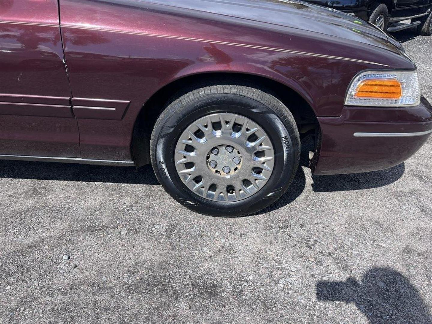 2003 Burgundy /Tan Ford Crown Victoria (2FAFP74W53X) with an 4.6l V8 EFI Sohc 4.6l engine, Automatic transmission, located at 745 East Steele Rd., West Columbia, SC, 29170, (803) 755-9148, 33.927212, -81.148483 - Special Internet Price! 2003 Ford Crown Victoria LX with AM/FM stereo radio, Air conditioning, Split-bench front seat, Leather interior, Powered windows, Powered door locks, Plus more! - Photo#23