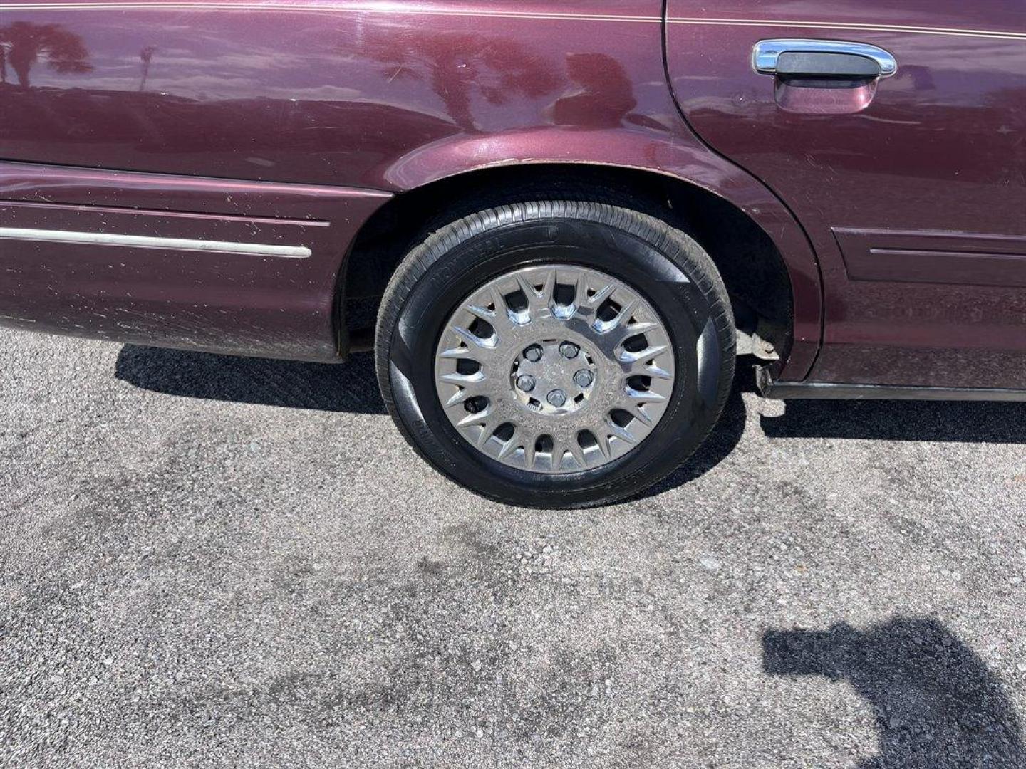 2003 Burgundy /Tan Ford Crown Victoria (2FAFP74W53X) with an 4.6l V8 EFI Sohc 4.6l engine, Automatic transmission, located at 745 East Steele Rd., West Columbia, SC, 29170, (803) 755-9148, 33.927212, -81.148483 - Special Internet Price! 2003 Ford Crown Victoria LX with AM/FM stereo radio, Air conditioning, Split-bench front seat, Leather interior, Powered windows, Powered door locks, Plus more! - Photo#24