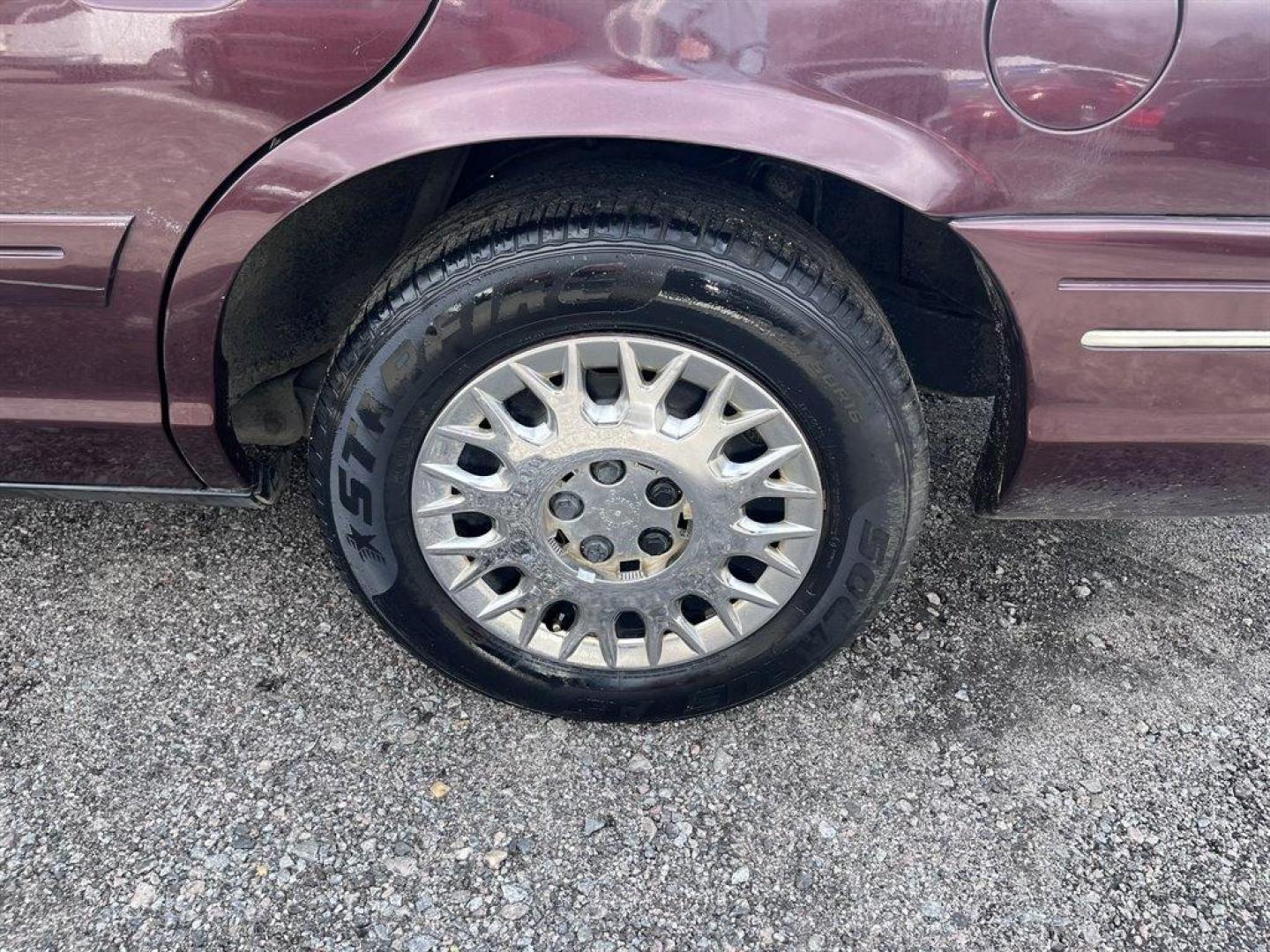 2003 Burgundy /Tan Ford Crown Victoria (2FAFP74W53X) with an 4.6l V8 EFI Sohc 4.6l engine, Automatic transmission, located at 745 East Steele Rd., West Columbia, SC, 29170, (803) 755-9148, 33.927212, -81.148483 - Special Internet Price! 2003 Ford Crown Victoria LX with AM/FM stereo radio, Air conditioning, Split-bench front seat, Leather interior, Powered windows, Powered door locks, Plus more! - Photo#25