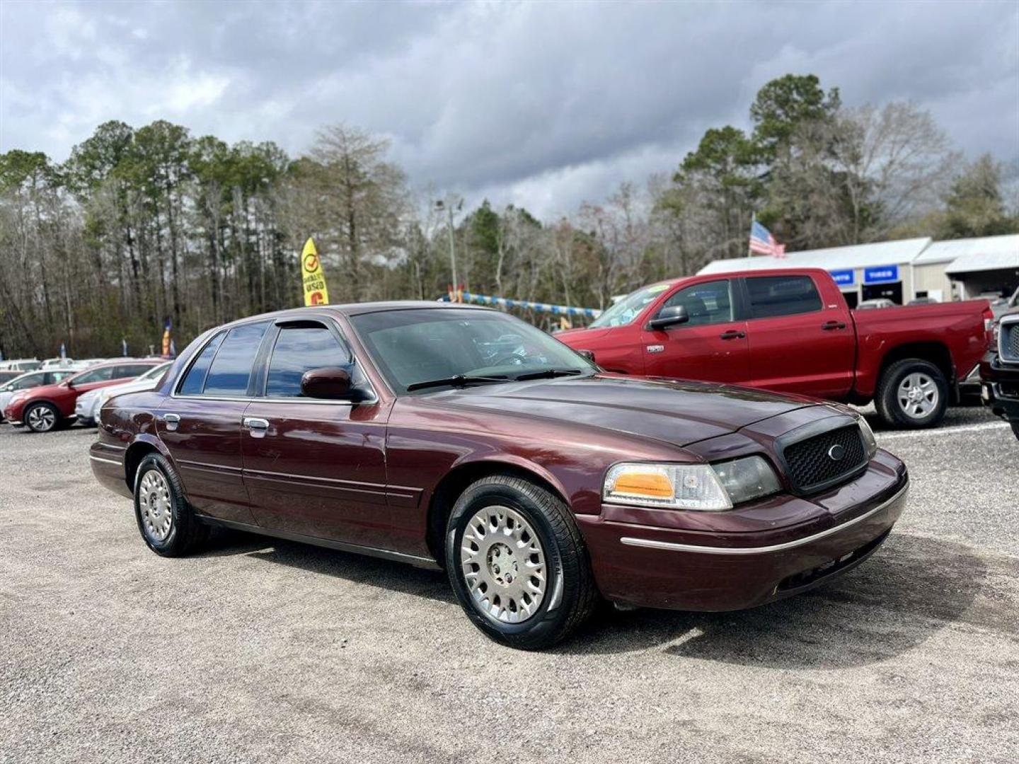 2003 Burgundy /Tan Ford Crown Victoria (2FAFP74W53X) with an 4.6l V8 EFI Sohc 4.6l engine, Automatic transmission, located at 745 East Steele Rd., West Columbia, SC, 29170, (803) 755-9148, 33.927212, -81.148483 - Special Internet Price! 2003 Ford Crown Victoria LX with AM/FM stereo radio, Air conditioning, Split-bench front seat, Leather interior, Powered windows, Powered door locks, Plus more! - Photo#3