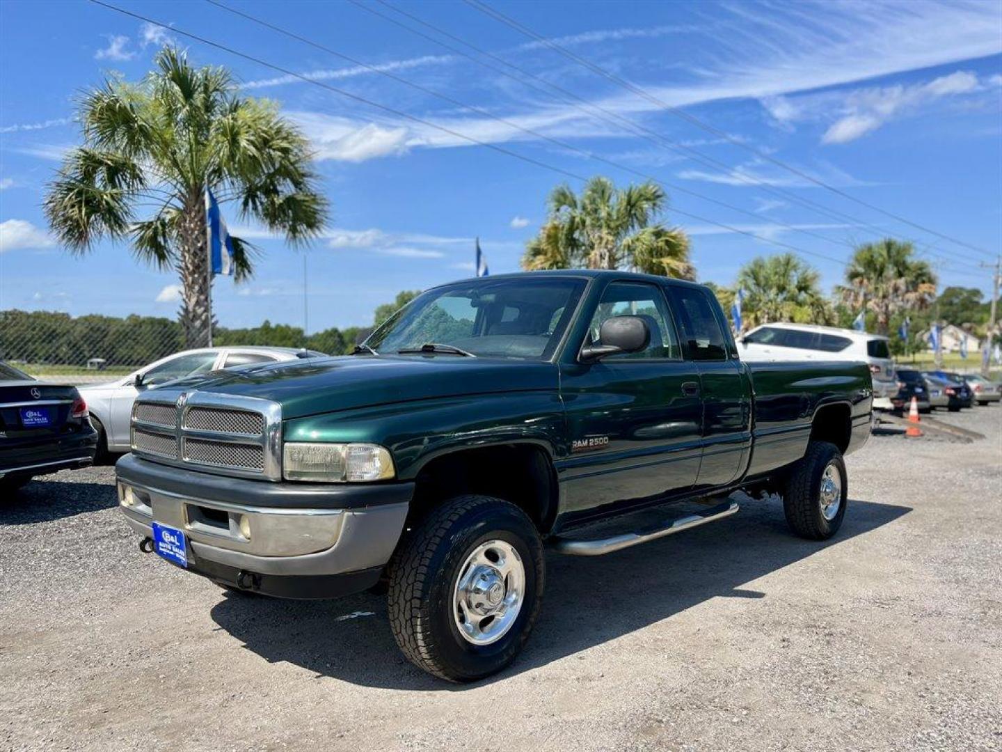 2001 Green /Grey Dodge RAM 2500 (3B7KF236X1G) with an 5.9l I-6 FI DSL T/C 5.9l engine, Automatic transmission, located at 745 East Steele Rd., West Columbia, SC, 29170, (803) 755-9148, 33.927212, -81.148483 - Special Internet Price! 2001 Dodge RAM 2500 Laramie SLT with AM/FM radio, Cruise control, 4X4, Cloth interior, Manual air conditioning, Rear folding bench seat, Powered windows, Powered door locks, Plus more! - Photo#0