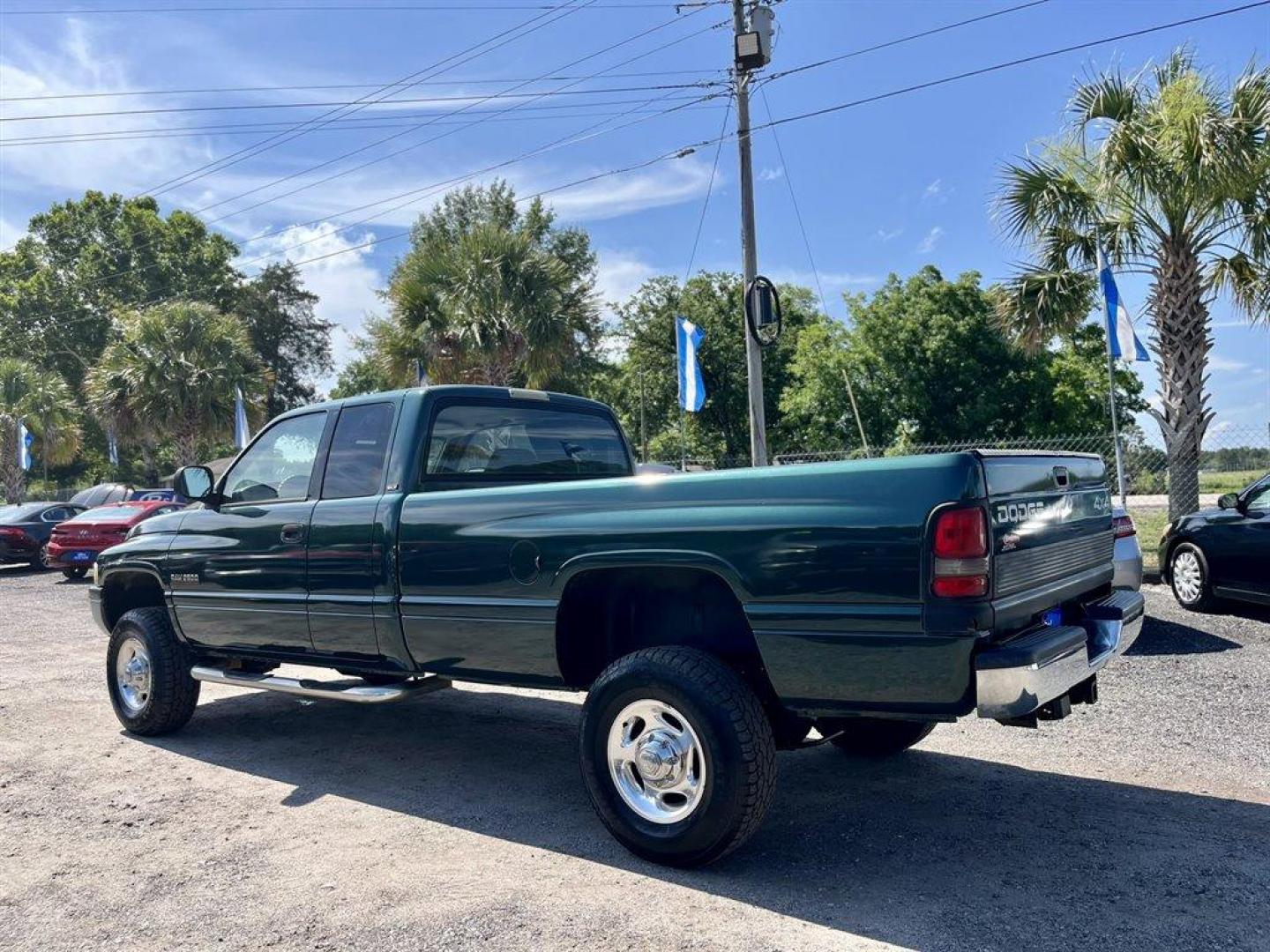 2001 Green /Grey Dodge RAM 2500 (3B7KF236X1G) with an 5.9l I-6 FI DSL T/C 5.9l engine, Automatic transmission, located at 745 East Steele Rd., West Columbia, SC, 29170, (803) 755-9148, 33.927212, -81.148483 - Special Internet Price! 2001 Dodge RAM 2500 Laramie SLT with AM/FM radio, Cruise control, 4X4, Cloth interior, Manual air conditioning, Rear folding bench seat, Powered windows, Powered door locks, Plus more! - Photo#1