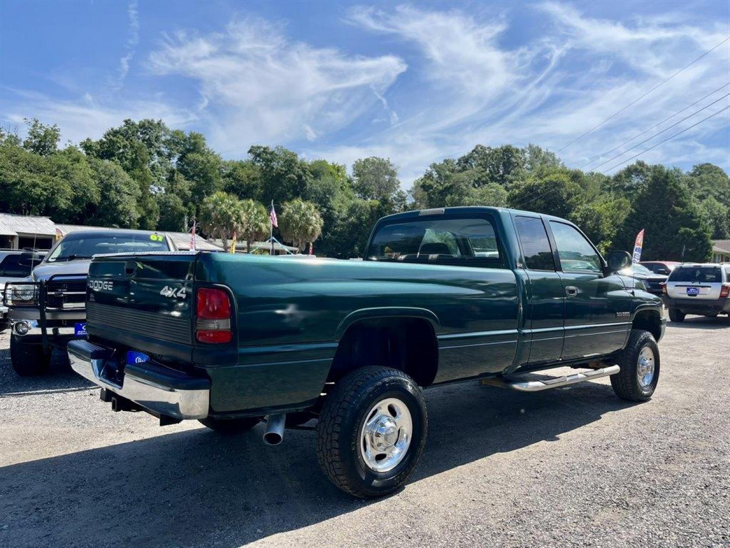 2001 Green /Grey Dodge RAM 2500 (3B7KF236X1G) with an 5.9l I-6 FI DSL T/C 5.9l engine, Automatic transmission, located at 745 East Steele Rd., West Columbia, SC, 29170, (803) 755-9148, 33.927212, -81.148483 - Special Internet Price! 2001 Dodge RAM 2500 Laramie SLT with AM/FM radio, Cruise control, 4X4, Cloth interior, Manual air conditioning, Rear folding bench seat, Powered windows, Powered door locks, Plus more! - Photo#2