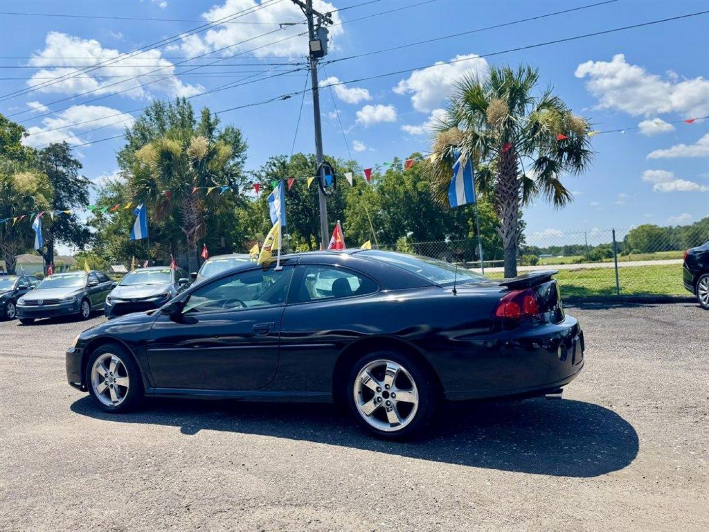 2004 Black /Taupe Dodge Stratus (4B3AG52H94E) with an 3.0l V6 EFI Sohc 3.0l engine, Automatic transmission, located at 745 East Steele Rd., West Columbia, SC, 29170, (803) 755-9148, 33.927212, -81.148483 - Special Internet Price! 2004 Dodge Stratus with AM/FM radio, Cruise control, Sunroof, Leather interior, Powered windows, Powered door locks, Plus more! - Photo#5