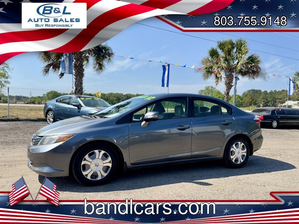 2012 Grey /Taupe Honda Civic (JHMFB4F2XCS) with an 1.5l I-4 MPI Sohc Hybrid engine, Automatic transmission, located at 745 East Steele Rd., West Columbia, SC, 29170, (803) 755-9148, 33.927212, -81.148483 - Photo#0