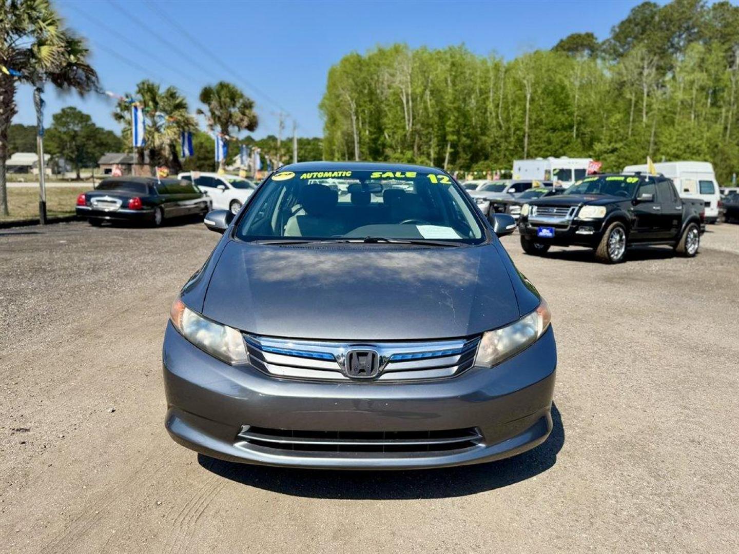 2012 Grey /Taupe Honda Civic (JHMFB4F2XCS) with an 1.5l I-4 MPI Sohc Hybrid engine, Automatic transmission, located at 745 East Steele Rd., West Columbia, SC, 29170, (803) 755-9148, 33.927212, -81.148483 - Photo#1