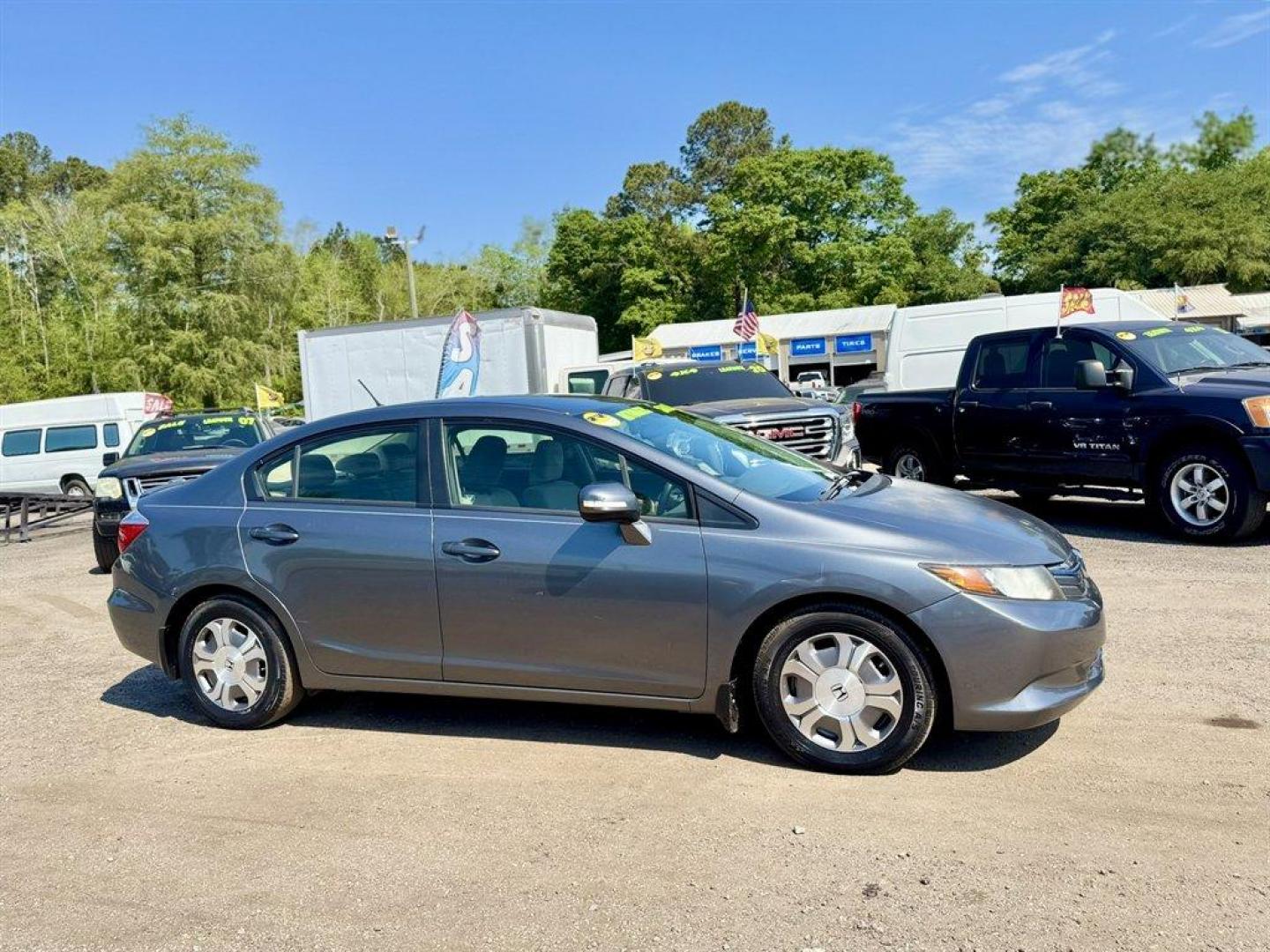 2012 Grey /Taupe Honda Civic (JHMFB4F2XCS) with an 1.5l I-4 MPI Sohc Hybrid engine, Automatic transmission, located at 745 East Steele Rd., West Columbia, SC, 29170, (803) 755-9148, 33.927212, -81.148483 - Photo#2