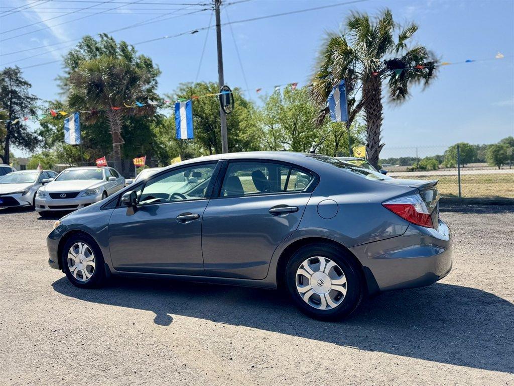 2012 Grey /Taupe Honda Civic (JHMFB4F2XCS) with an 1.5l I-4 MPI Sohc Hybrid engine, Automatic transmission, located at 745 East Steele Rd., West Columbia, SC, 29170, (803) 755-9148, 33.927212, -81.148483 - Photo#5