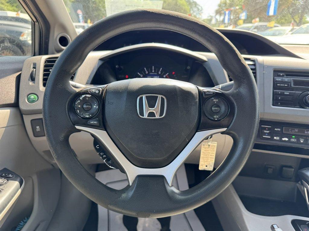 2012 Grey /Taupe Honda Civic (JHMFB4F2XCS) with an 1.5l I-4 MPI Sohc Hybrid engine, Automatic transmission, located at 745 East Steele Rd., West Columbia, SC, 29170, (803) 755-9148, 33.927212, -81.148483 - Photo#7