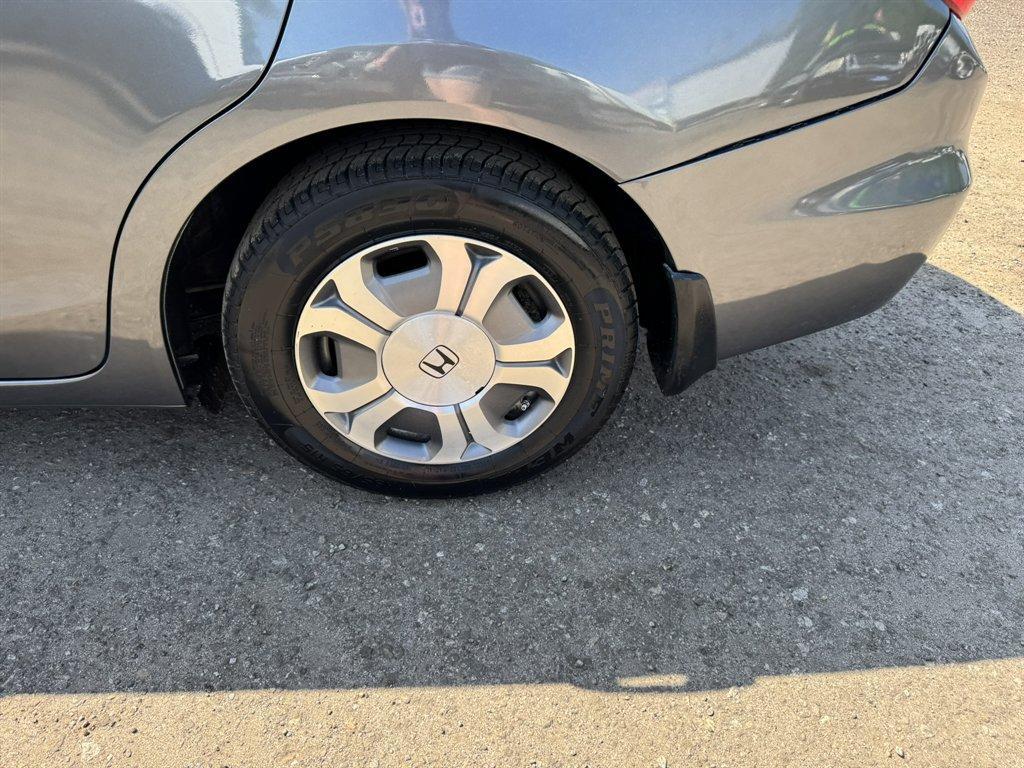 2012 Grey /Taupe Honda Civic (JHMFB4F2XCS) with an 1.5l I-4 MPI Sohc Hybrid engine, Automatic transmission, located at 745 East Steele Rd., West Columbia, SC, 29170, (803) 755-9148, 33.927212, -81.148483 - Photo#28