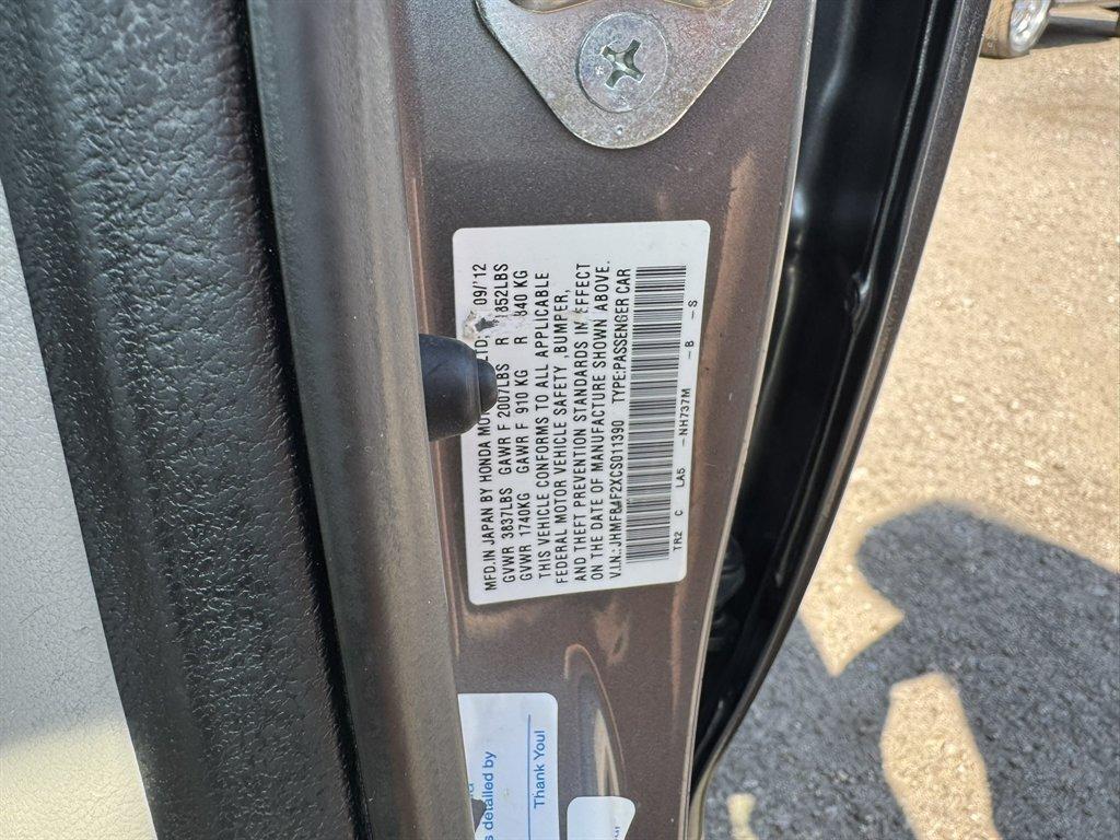 2012 Grey /Taupe Honda Civic (JHMFB4F2XCS) with an 1.5l I-4 MPI Sohc Hybrid engine, Automatic transmission, located at 745 East Steele Rd., West Columbia, SC, 29170, (803) 755-9148, 33.927212, -81.148483 - Photo#30