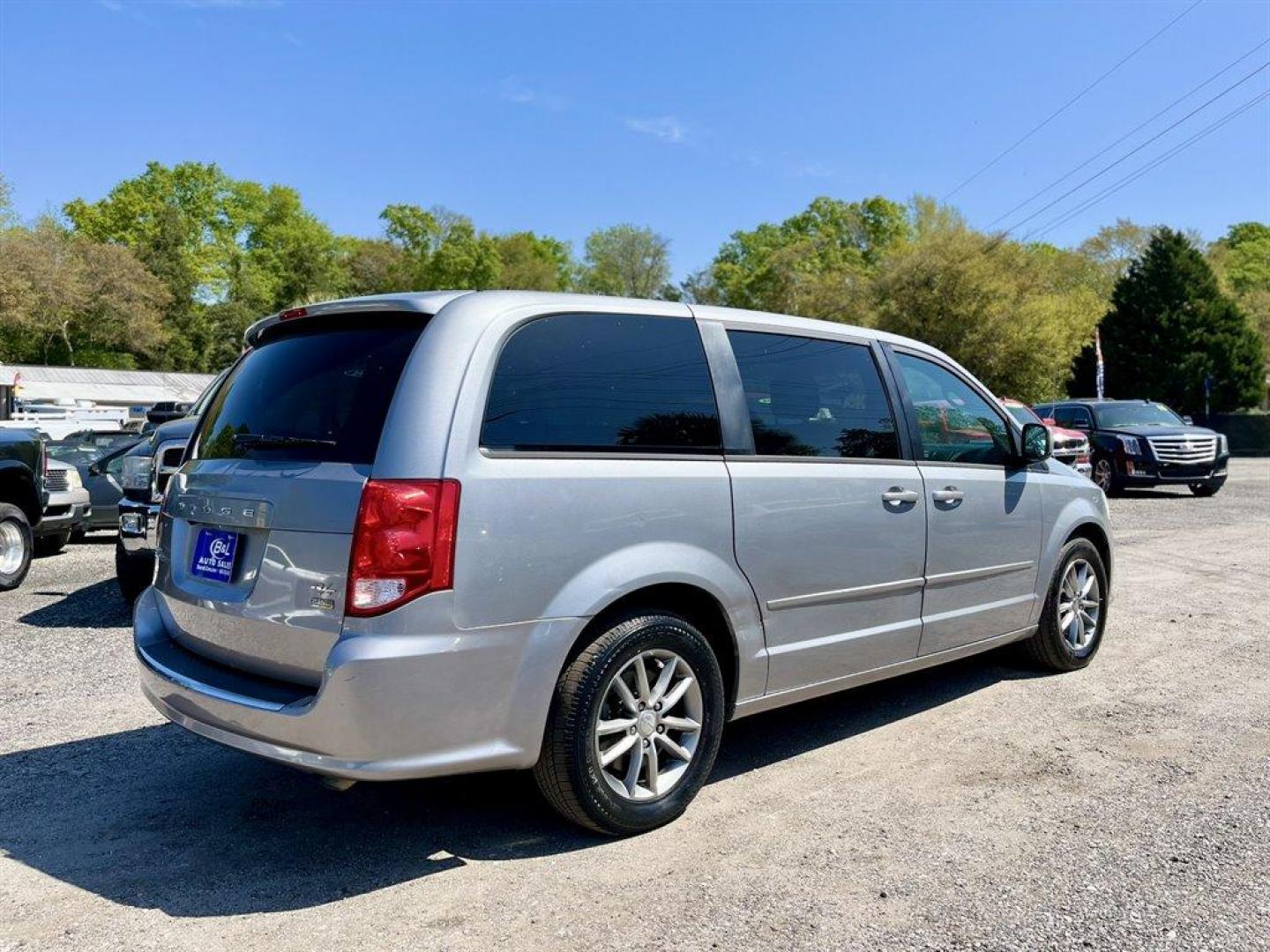 2014 Silver /Black Dodge Grand Caravan (2C4RDGEG4ER) with an 3.6l V6 MPI Dohc VVT Flex engine, Automatic transmission, located at 745 East Steele Rd., West Columbia, SC, 29170, (803) 755-9148, 33.927212, -81.148483 - Special Internet Price! 2014 Dodge Grand Caravan with SiriusXM AM/FM/Satellite, Bluetooth, Cruise Control, Dual Zone Front Automatic Air Conditioning, 2nd Row Bucket Seats, 3rd Row Fixed 60-40 Split-Bench, Cloth Interior, Powered Front Seats, Powered Liftgate, Powered Rear Sliding Doors, Plus More! - Photo#2